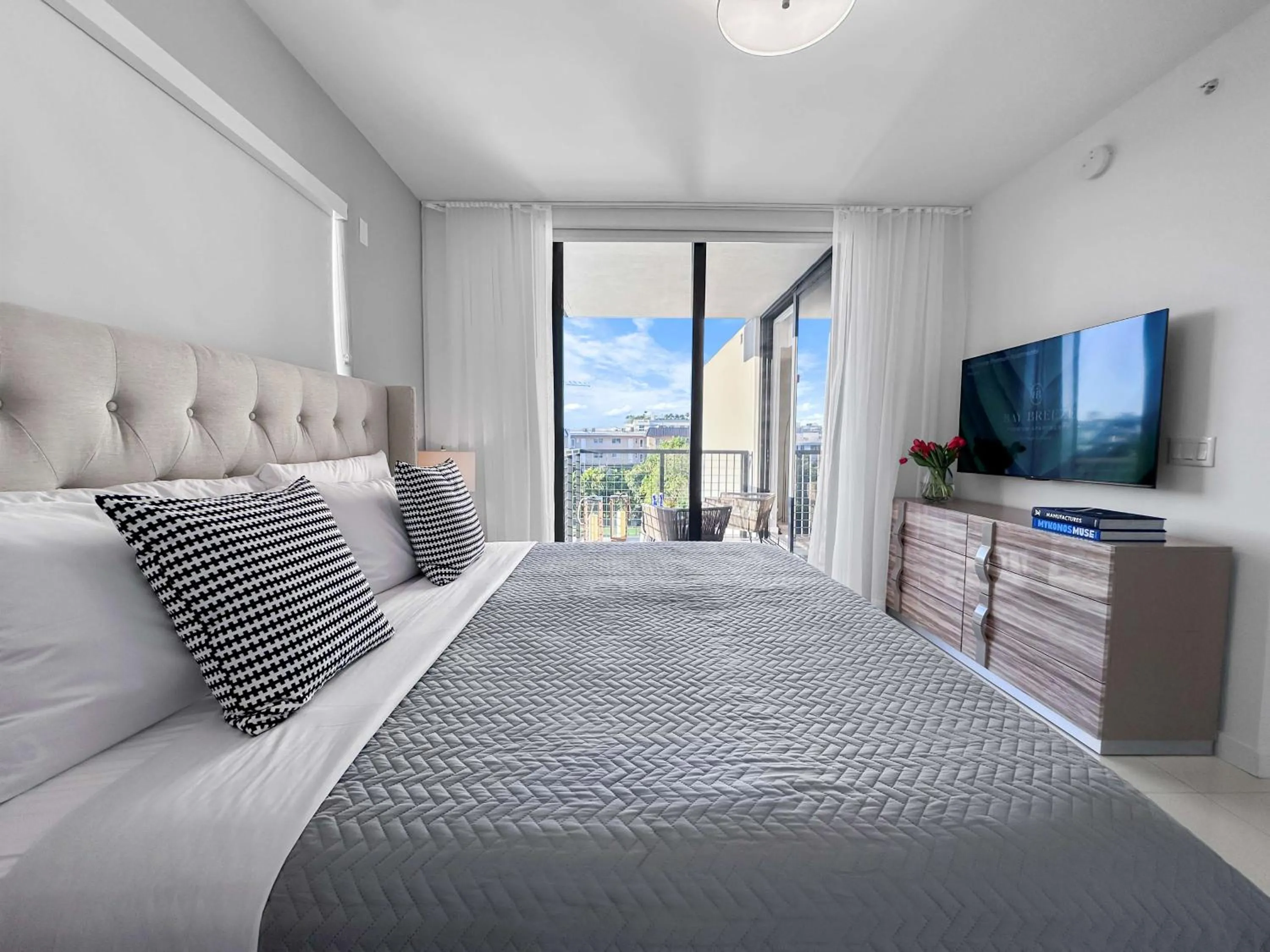 Bed in Bay Breeze Premium Apartments by Eskape Collection
