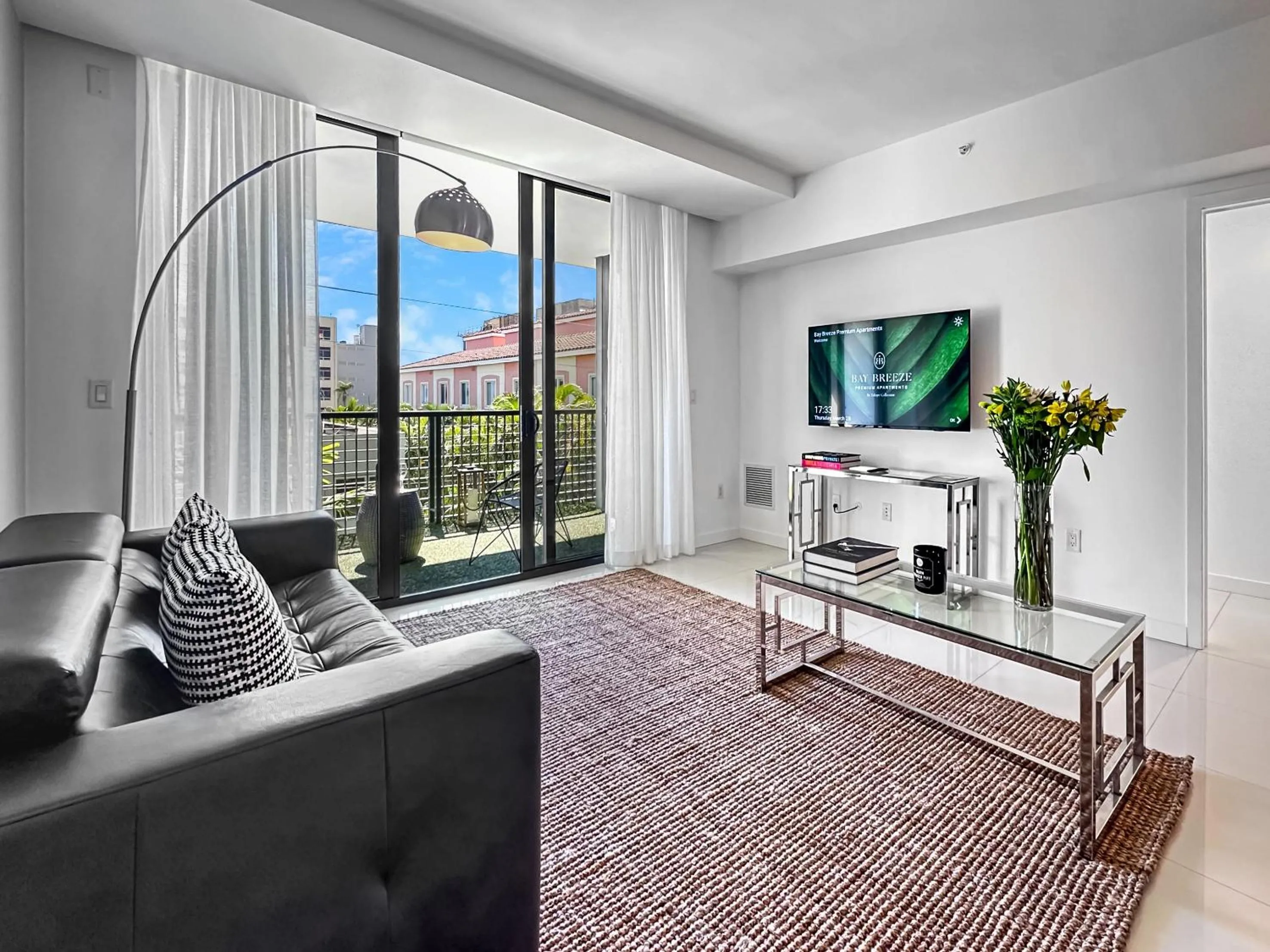 TV and multimedia in Bay Breeze Premium Apartments by Eskape Collection