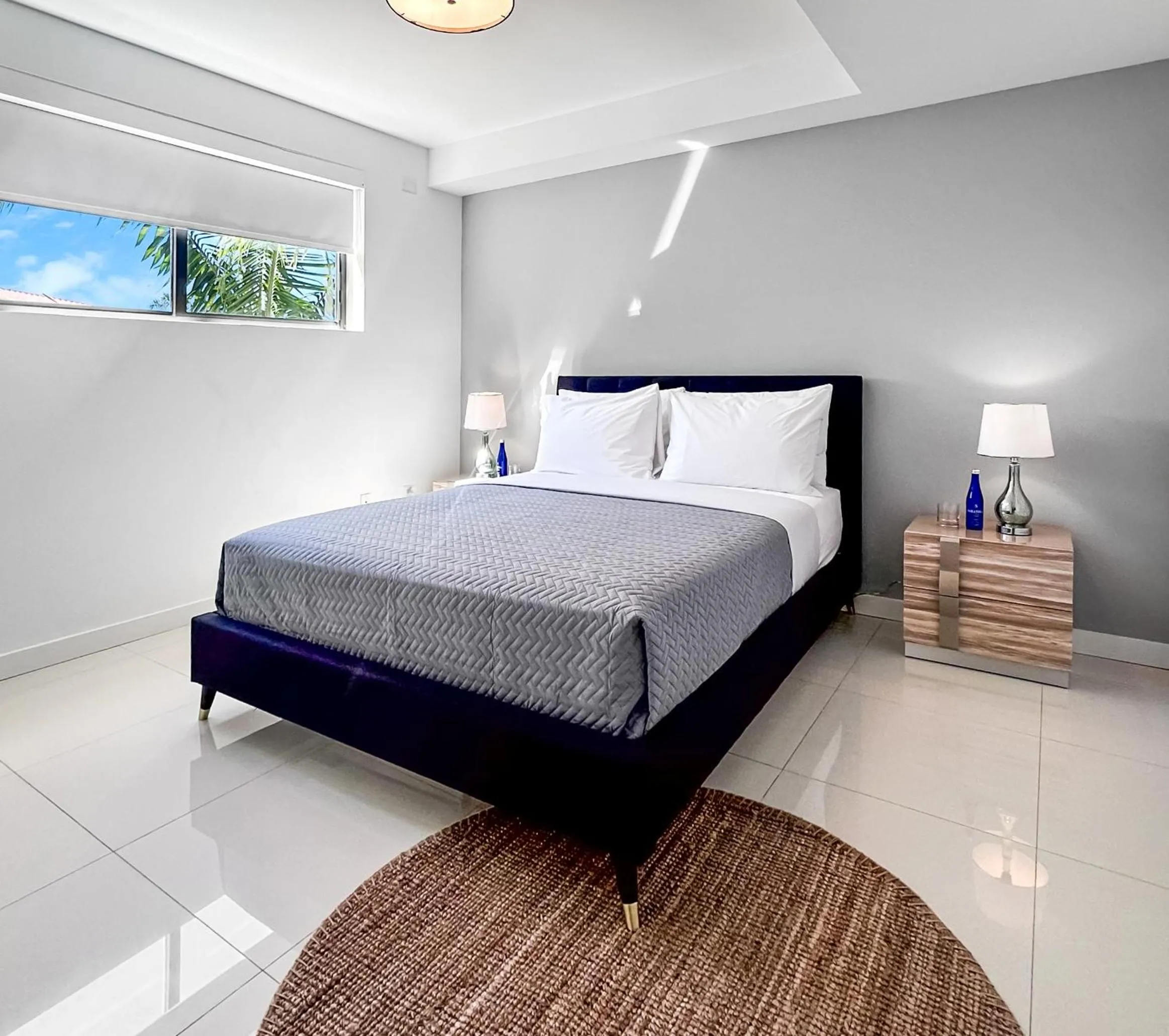 Bed in Bay Breeze Premium Apartments by Eskape Collection