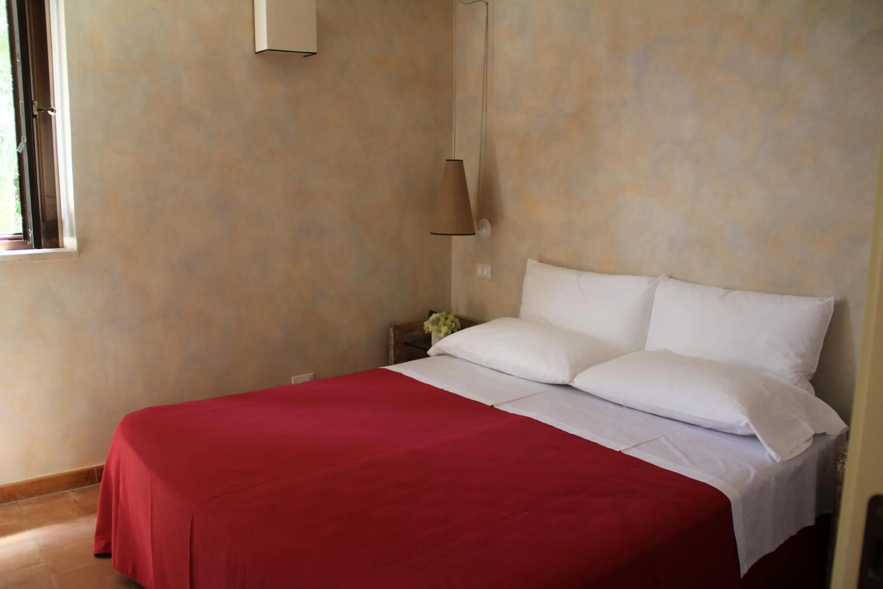 Bed in Tenuta Conte Ruggero