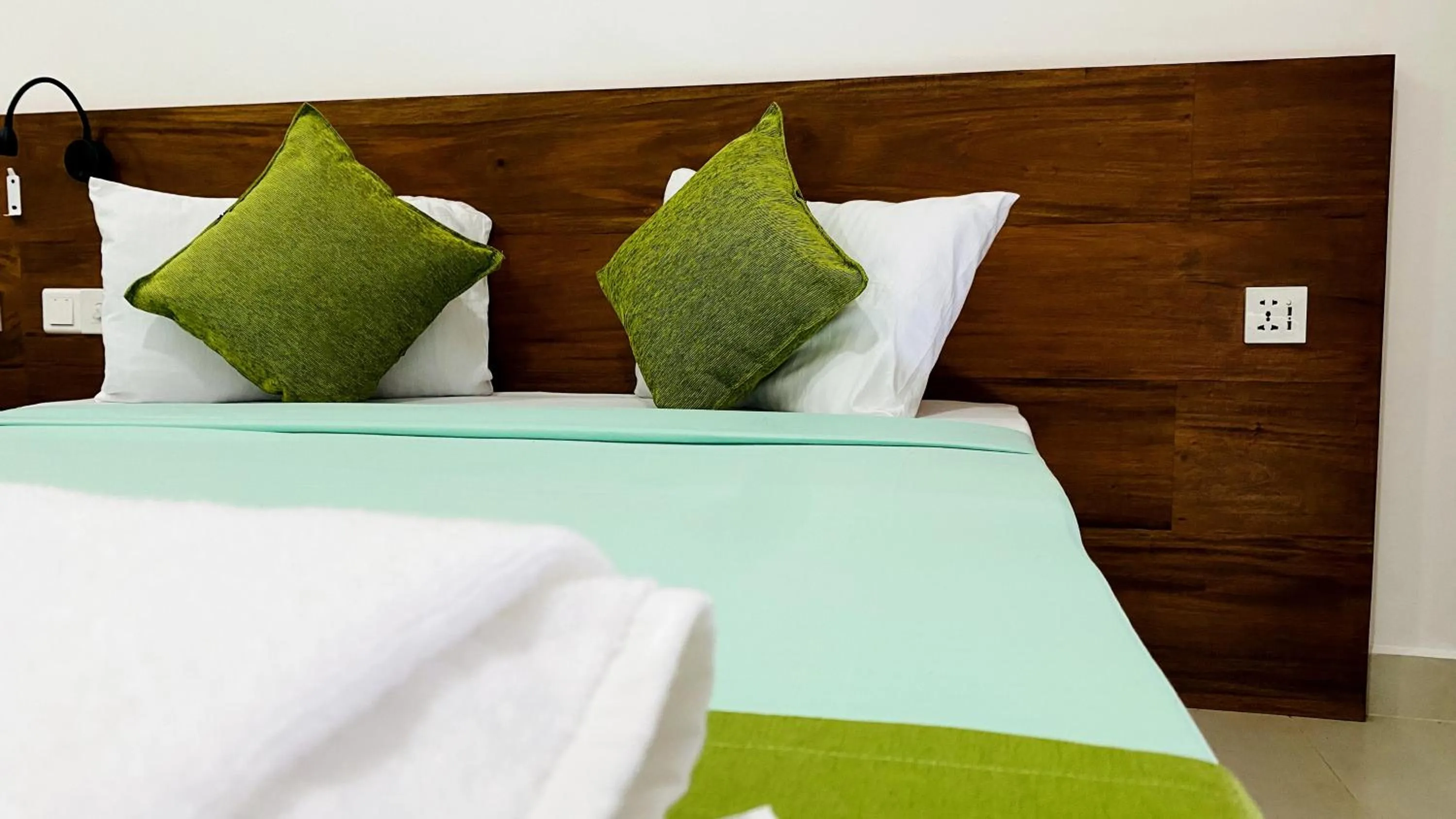 Bed in EllaCrest by Aloft