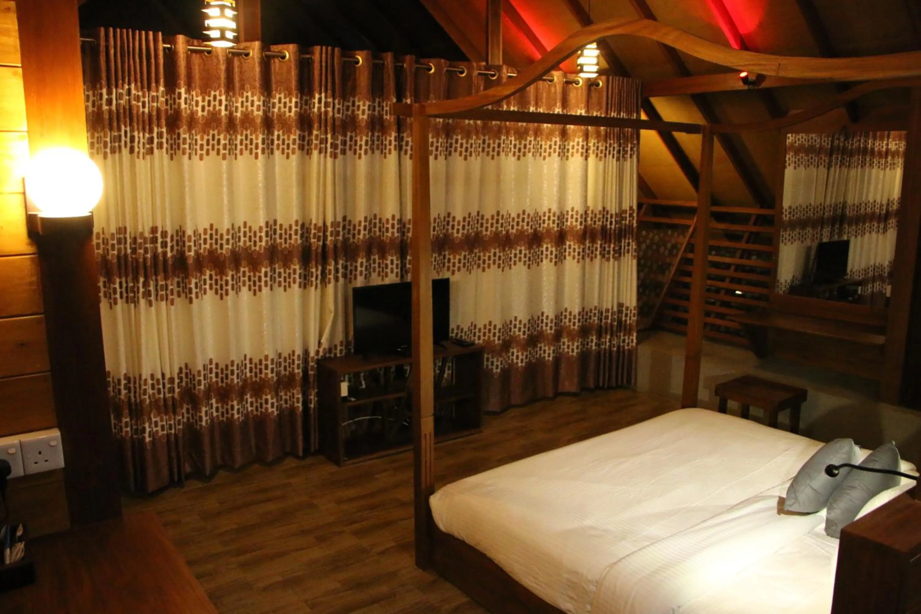 Bed in EllaCrest by Aloft