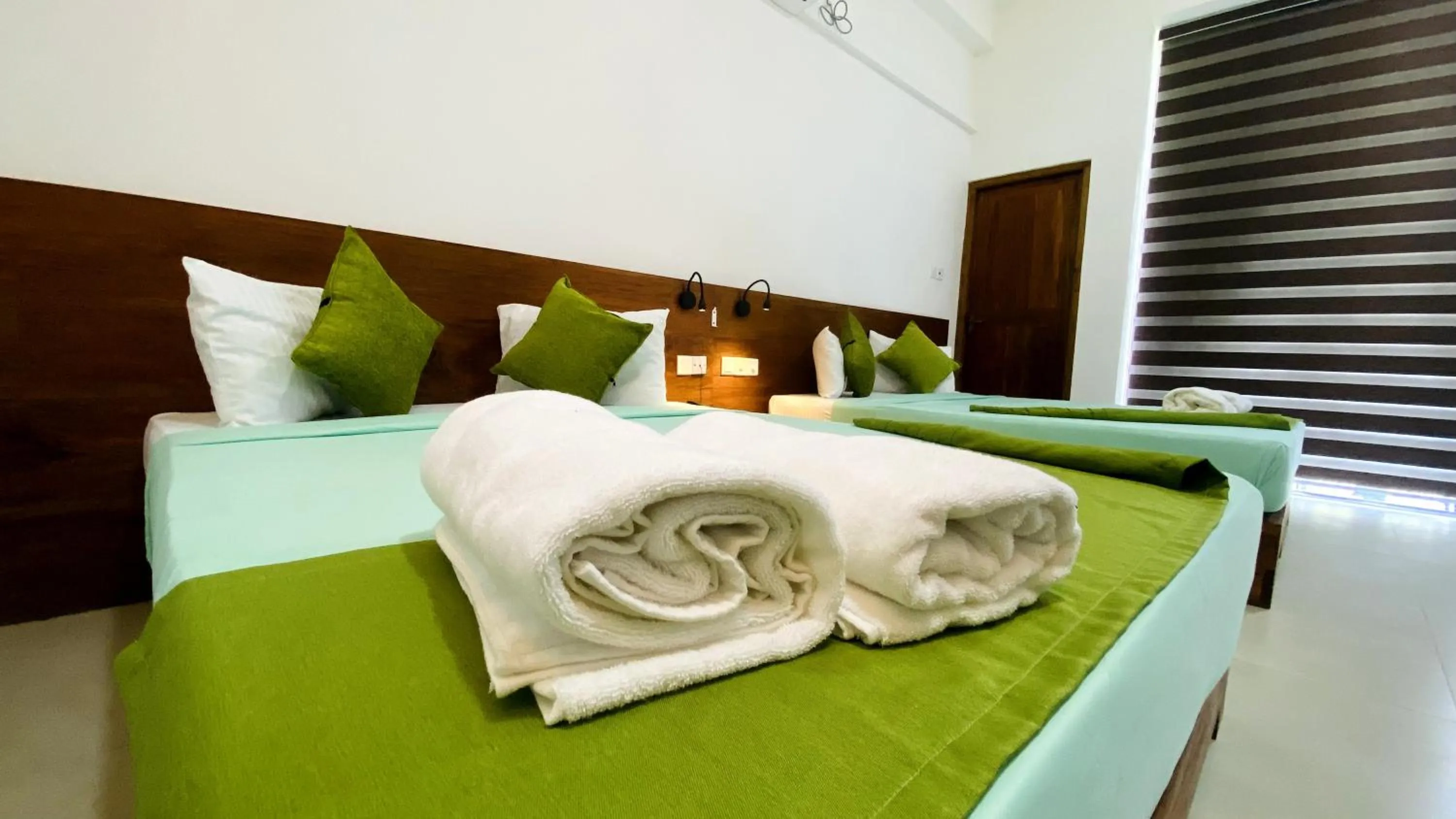 Bed in EllaCrest by Aloft