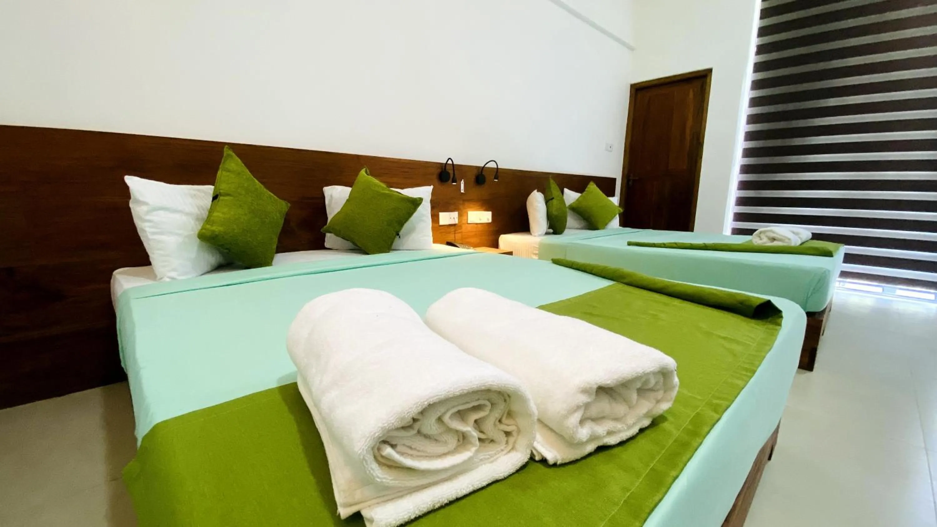 Bed in EllaCrest by Aloft