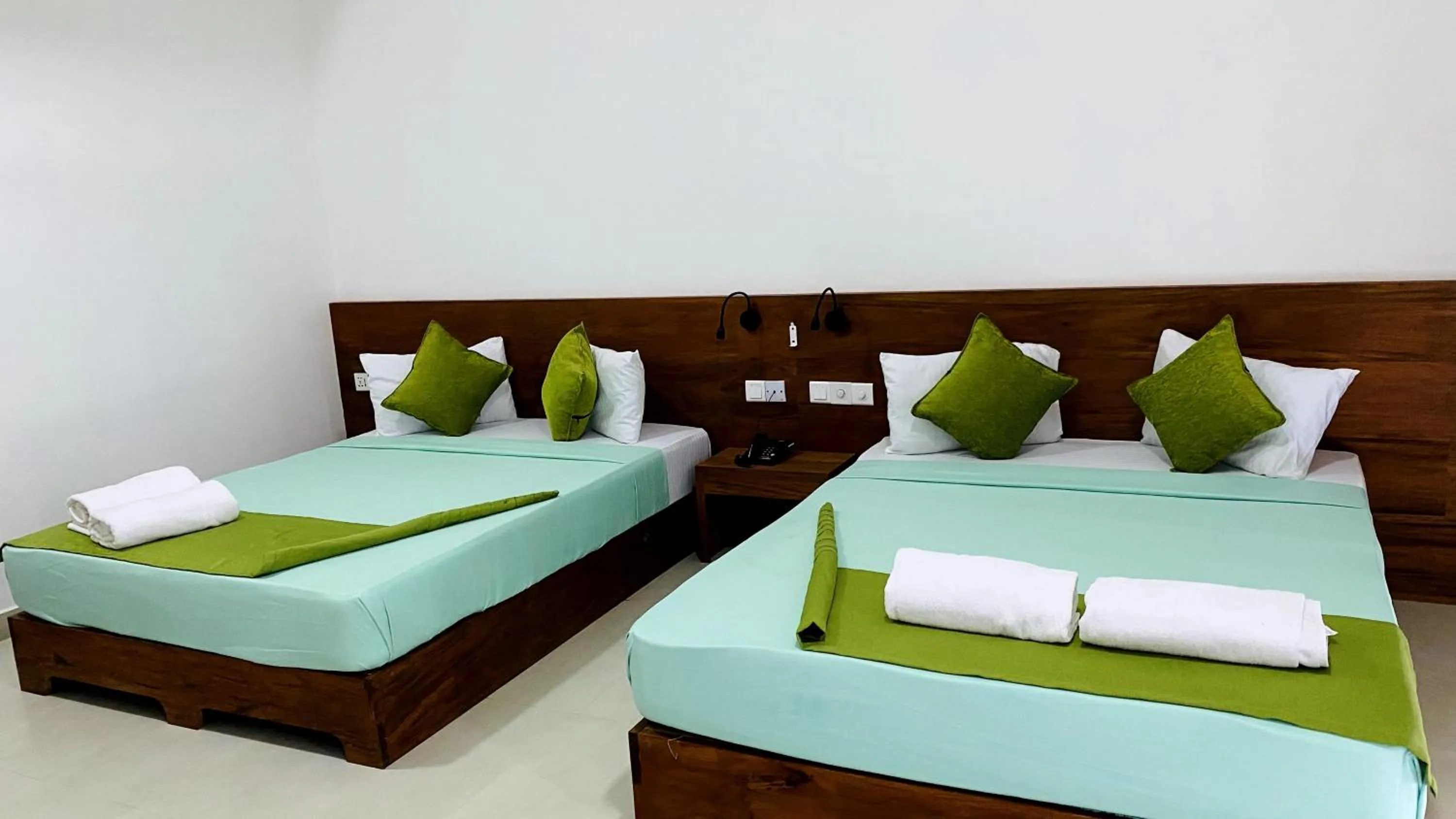 Bed in EllaCrest by Aloft