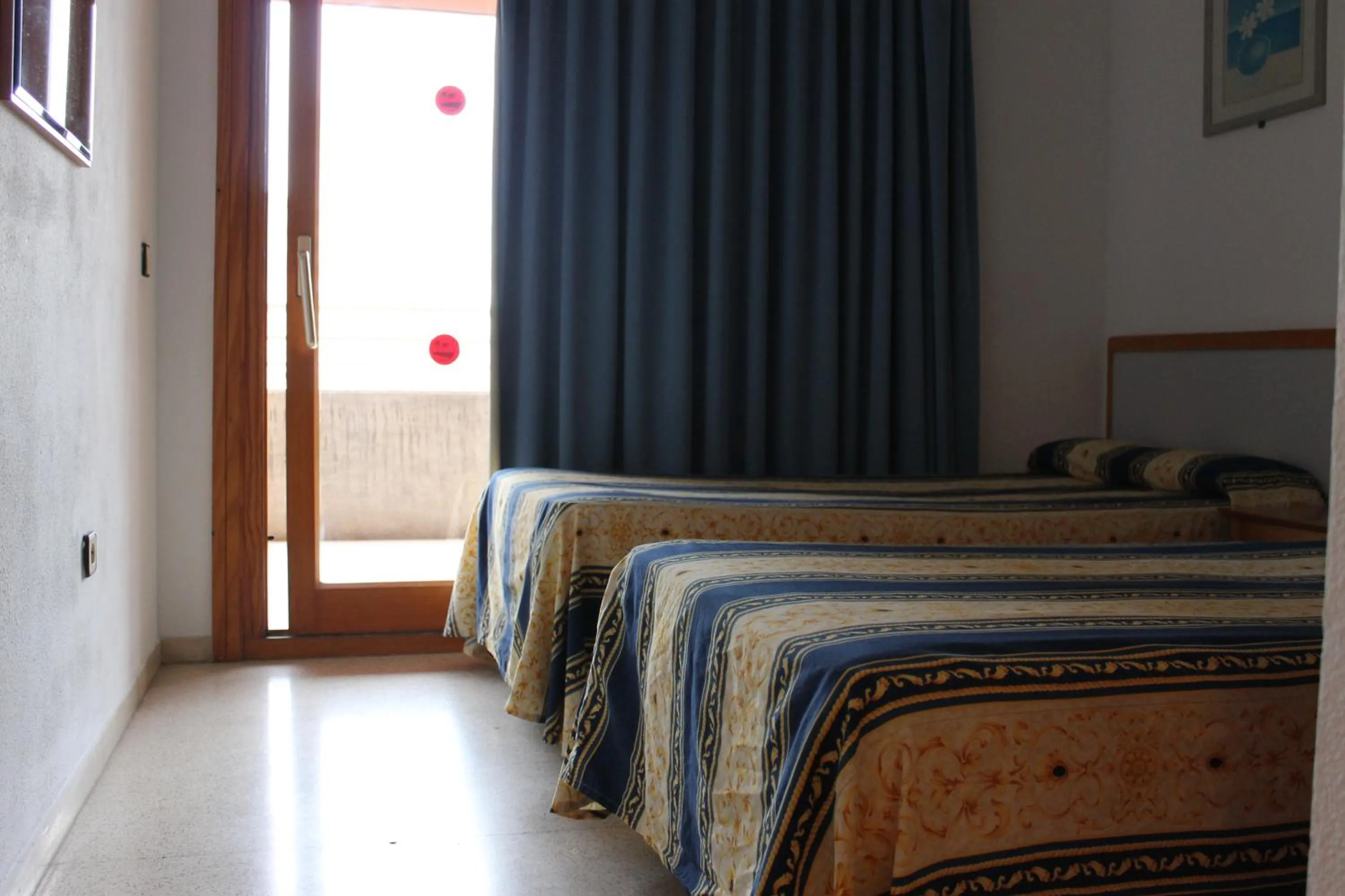 Bed in Apartamentos Alpha