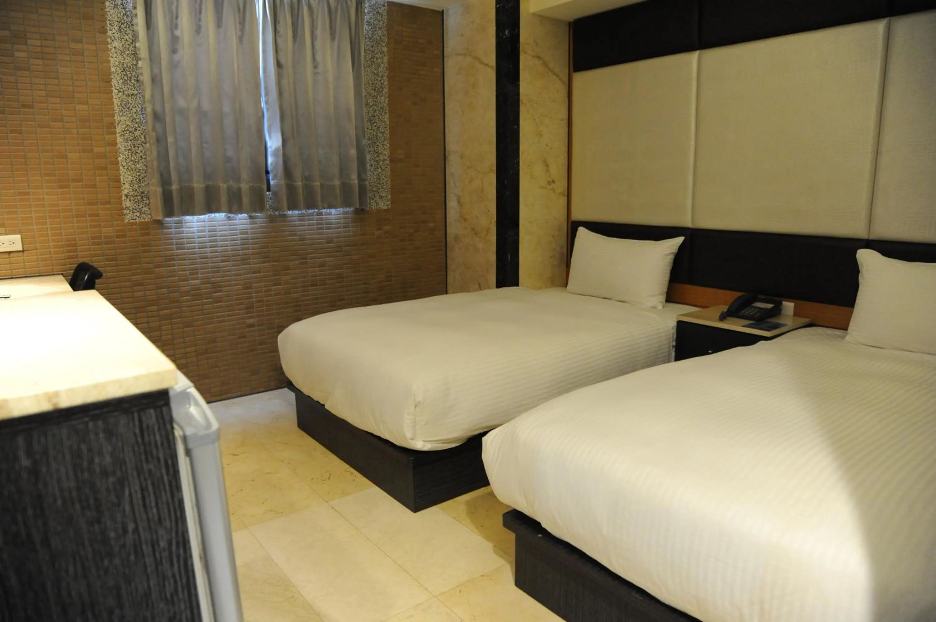 Bed in Michelle hotel