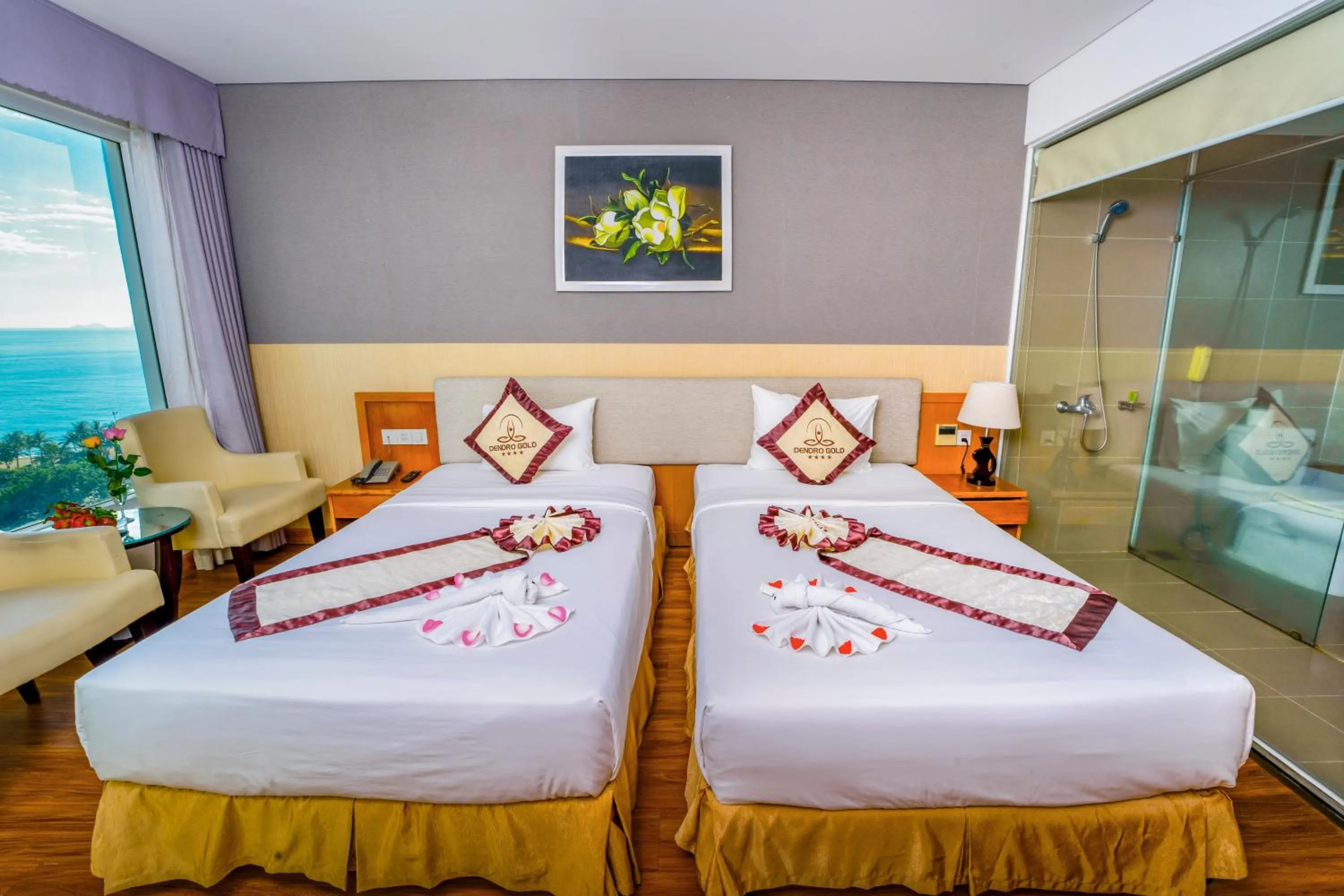 Bed in Dendro Gold Hotel