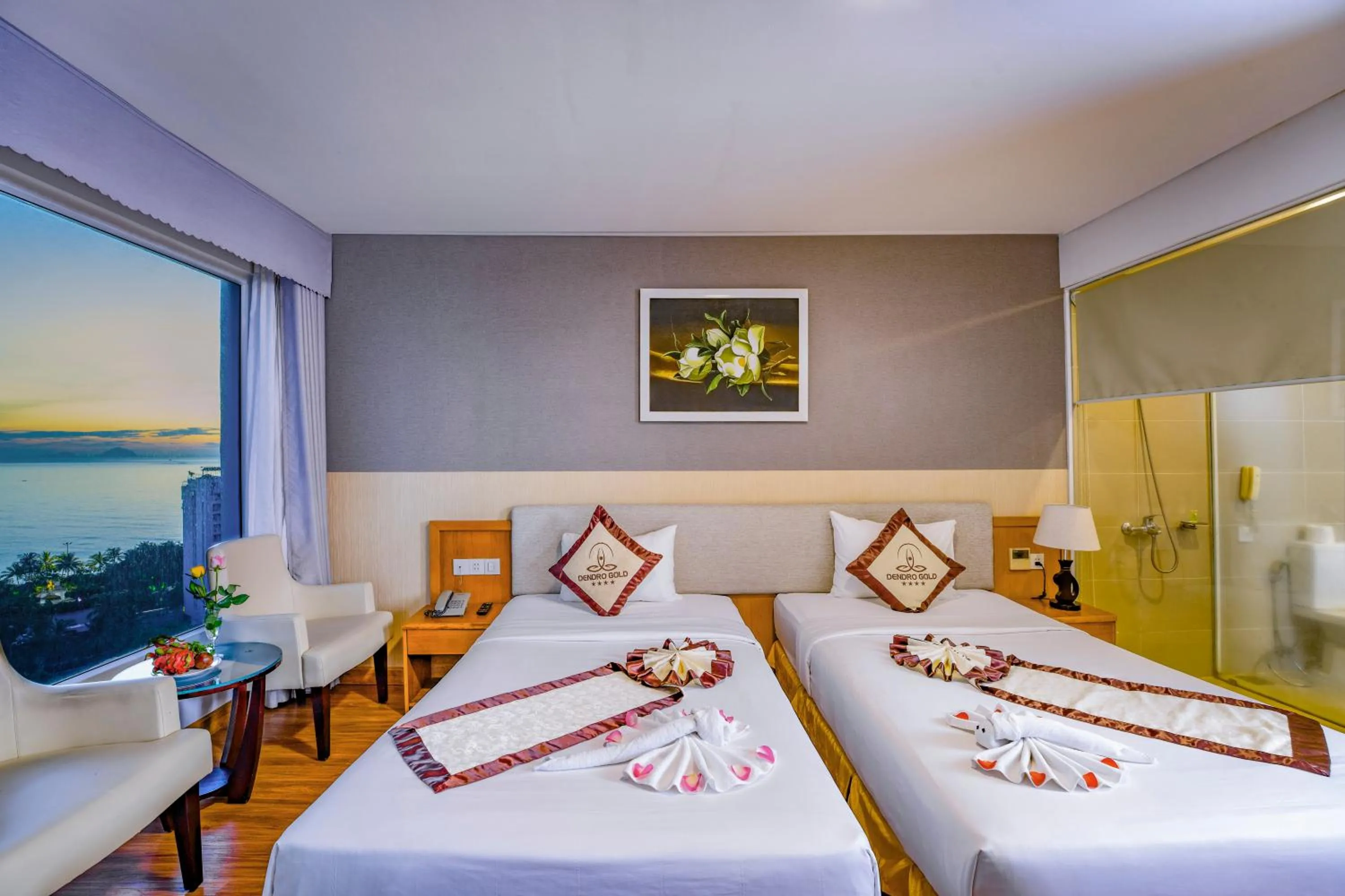 Bed in Dendro Gold Hotel