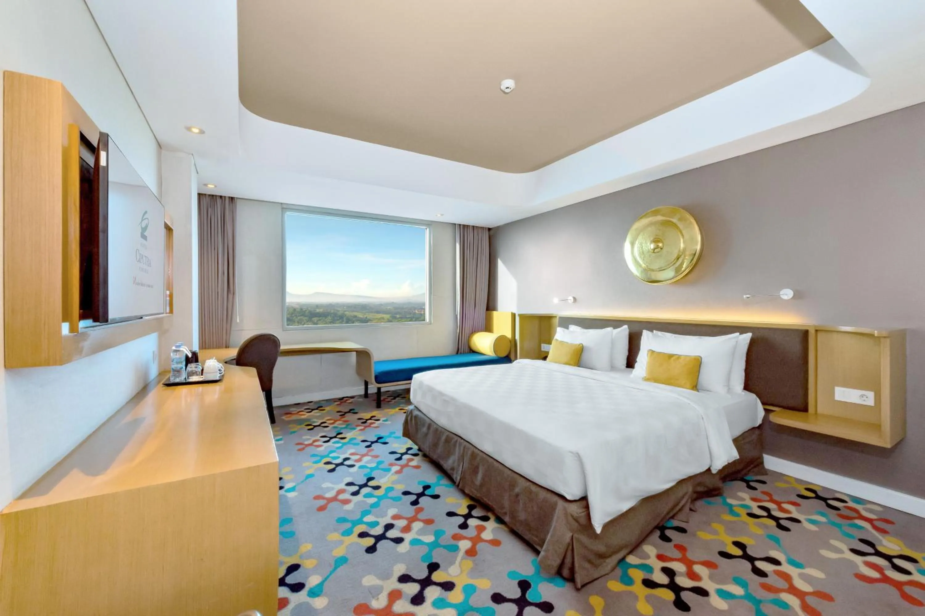 Seating area, Bed in Hotel Ciputra Cibubur managed by Swiss-Belhotel International