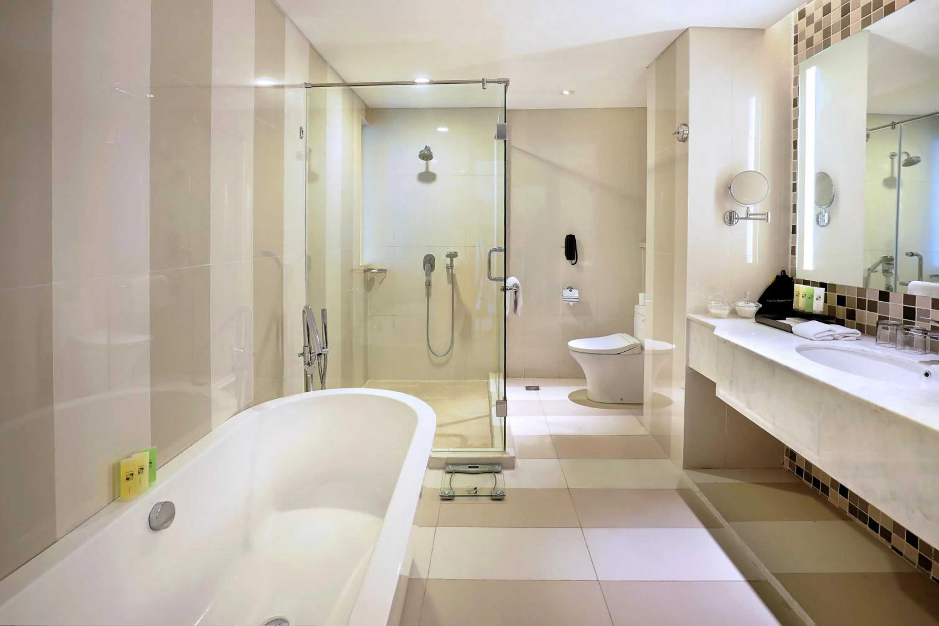 Bathroom in Hotel Ciputra Cibubur managed by Swiss-Belhotel International