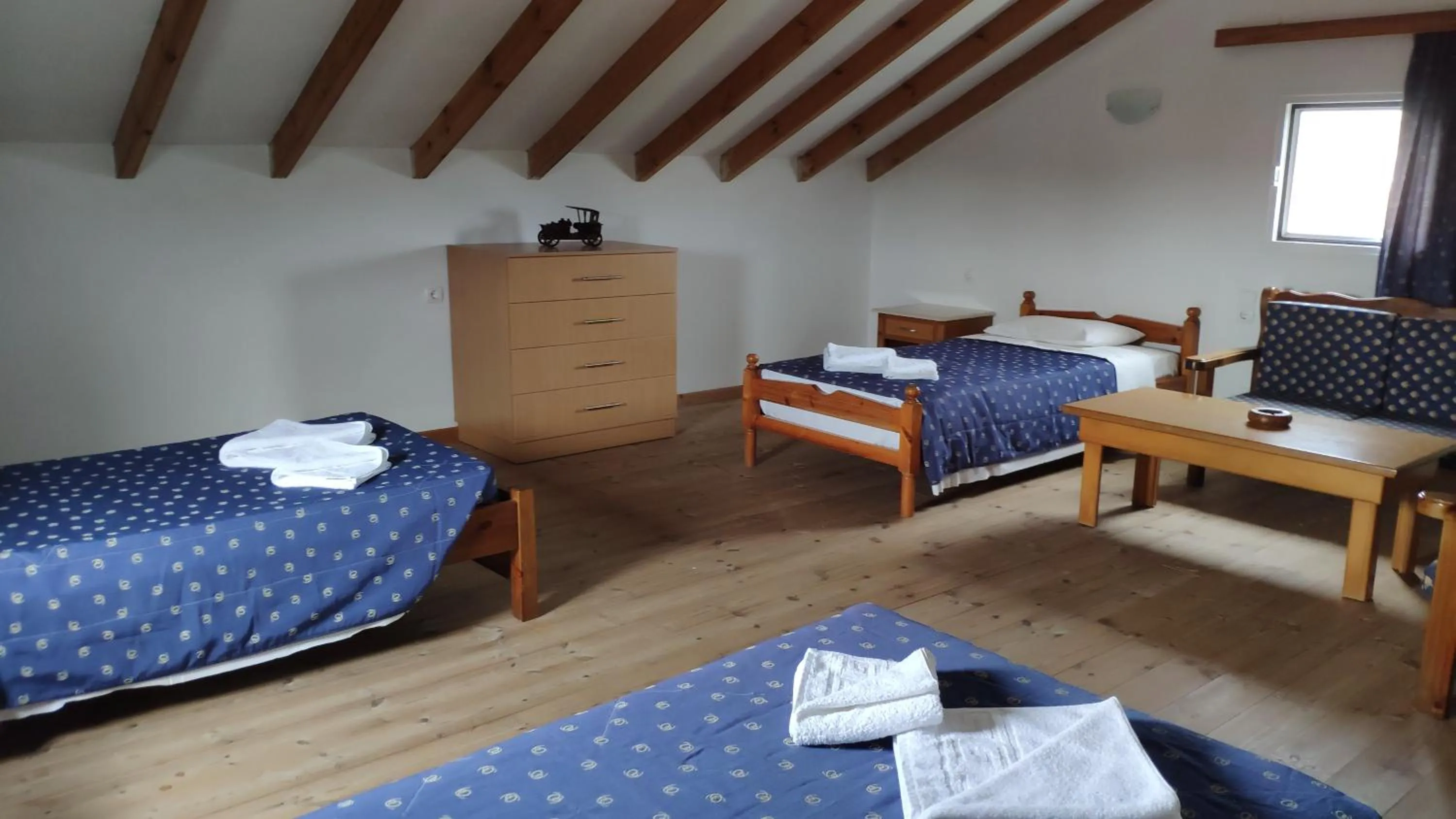 Bed in Tondoris Apartments