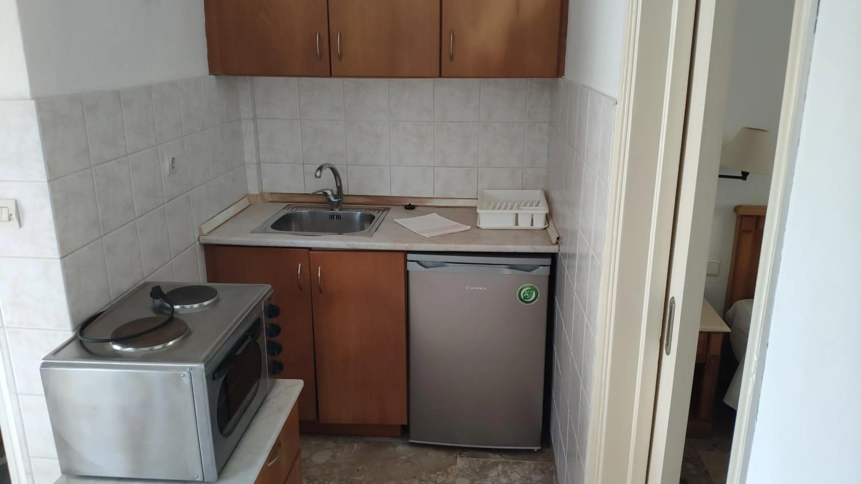 Kitchen or kitchenette in Tondoris Apartments
