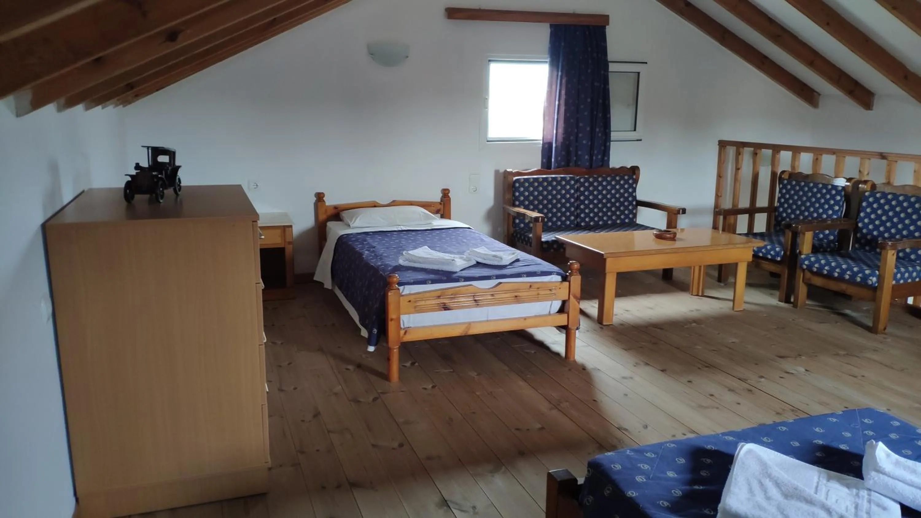 Bed in Tondoris Apartments