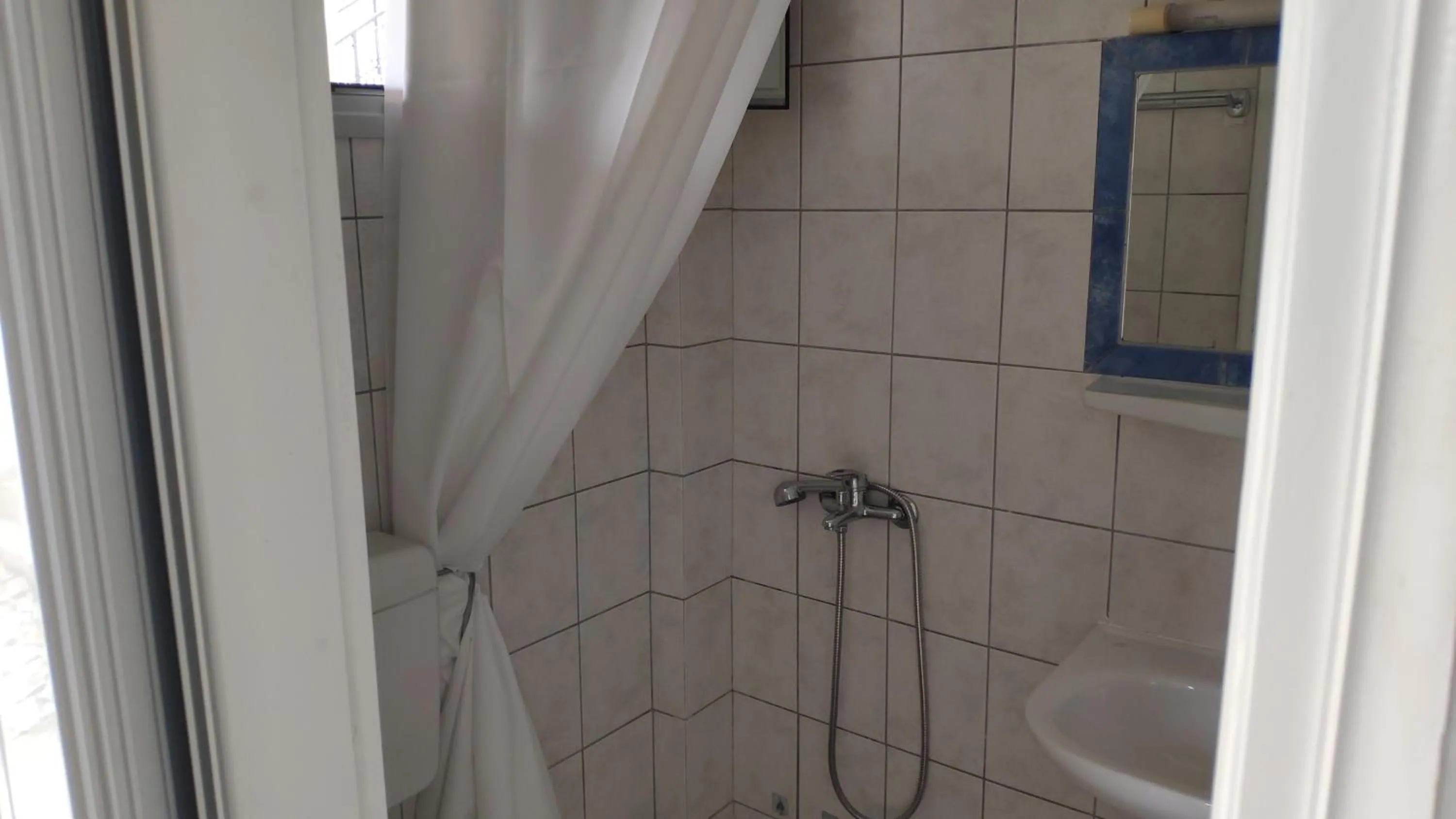 Shower in Tondoris Apartments