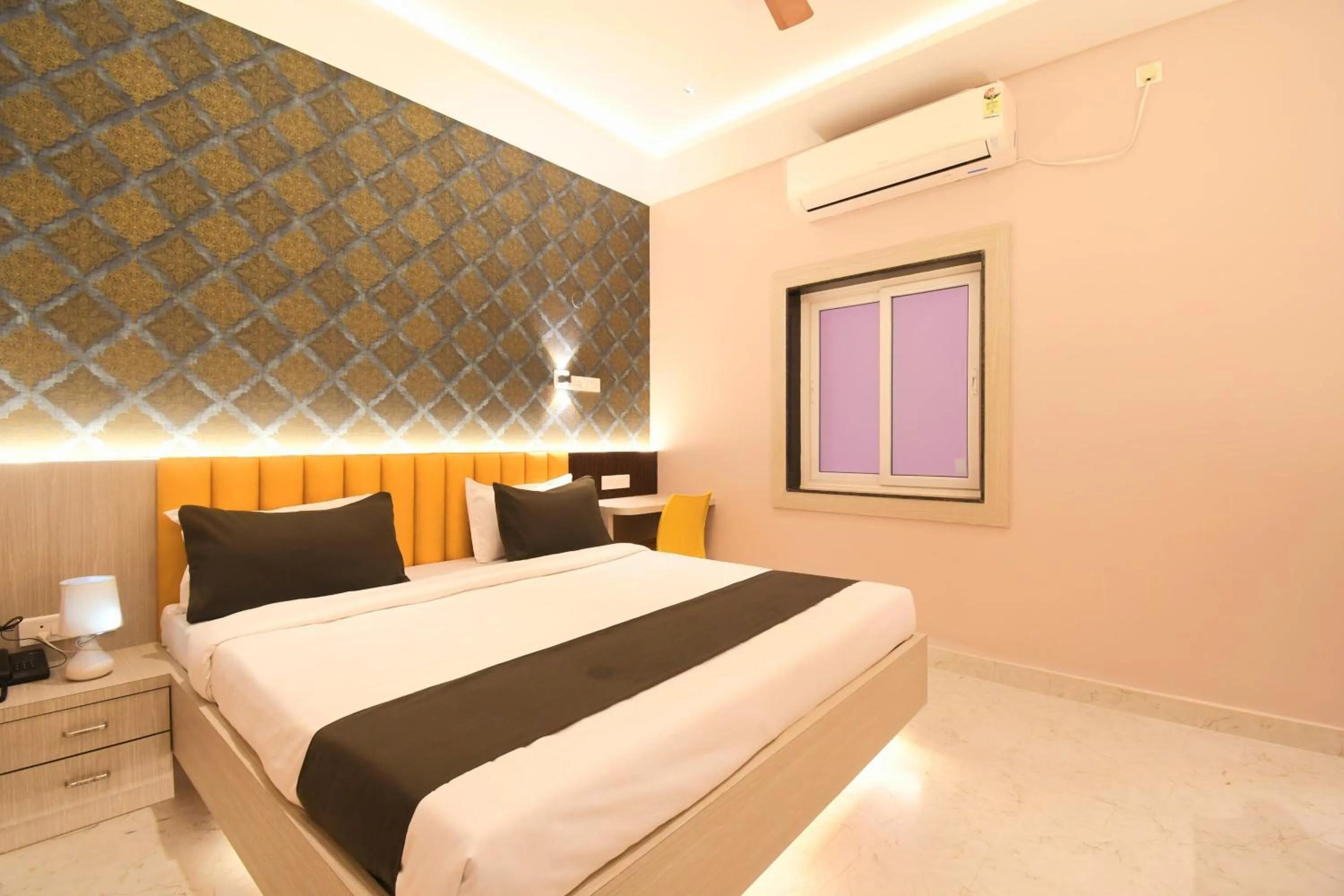 Bed in Hotel Sai Swastik