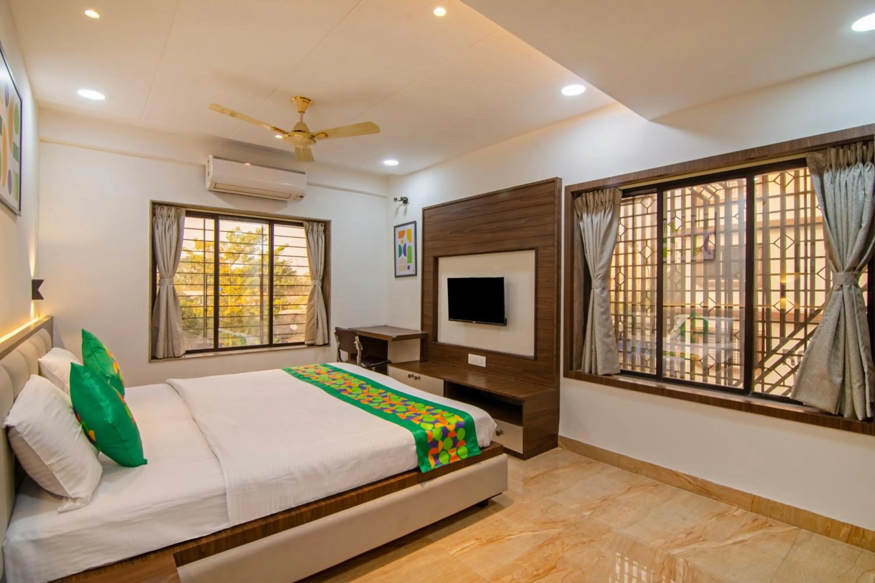 Bedroom, Bed in Treebo Petals Suites & Banquet - New Town