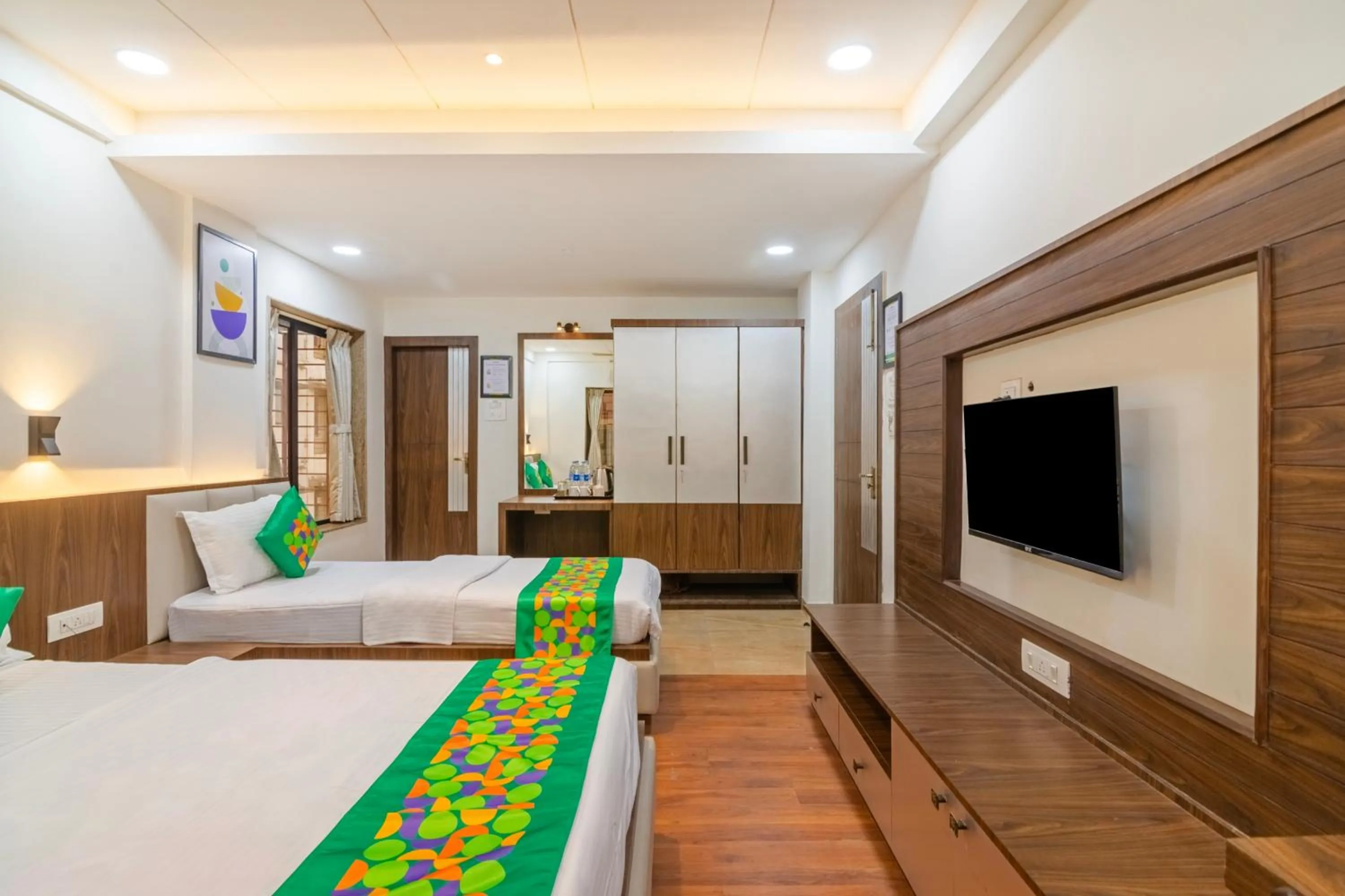 Bedroom, Bed in Treebo Petals Suites & Banquet - New Town