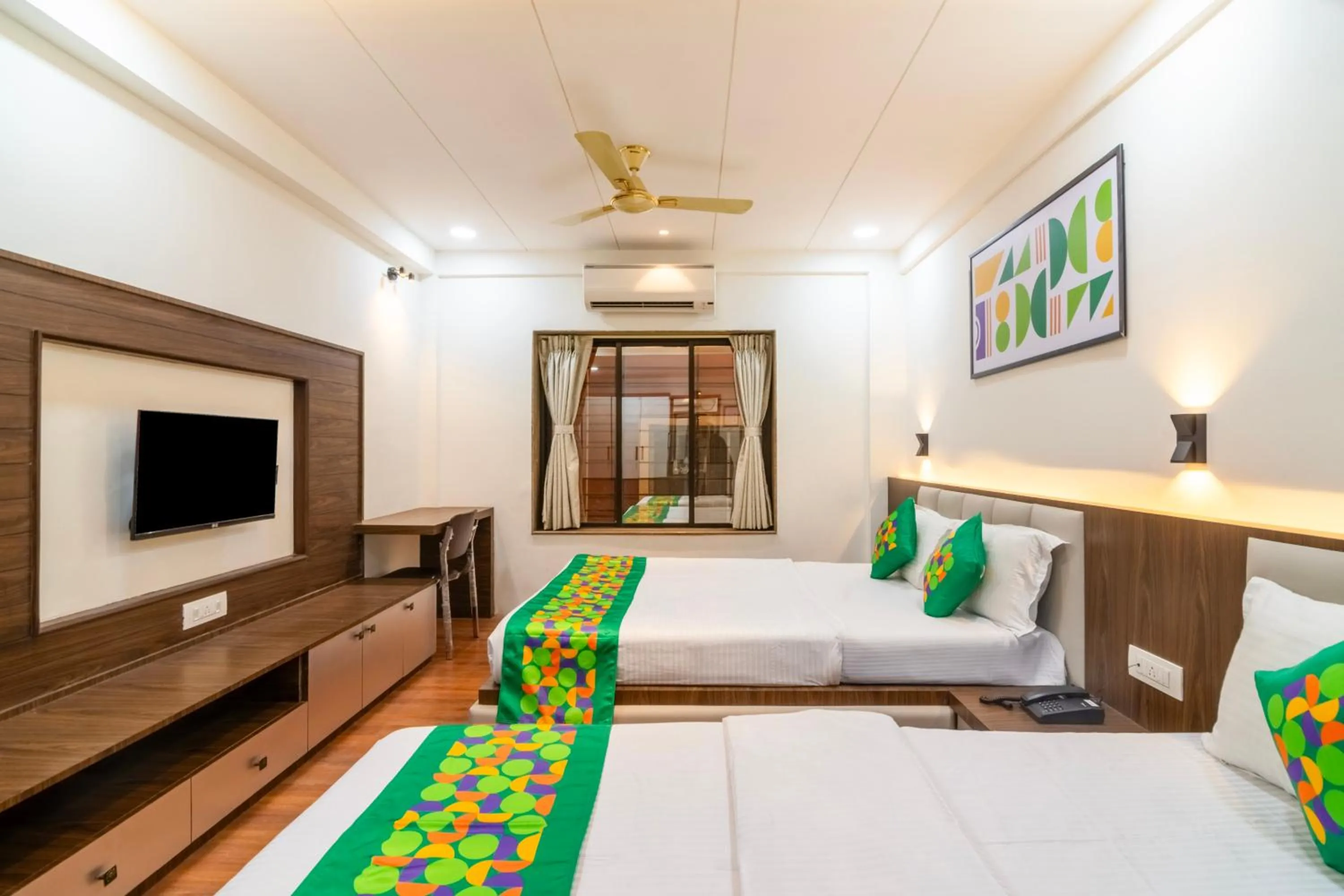 Bedroom, Bed in Treebo Petals Suites & Banquet - New Town