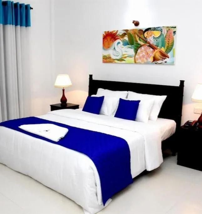 Bed in Blue Spring Hotel Wadduwa