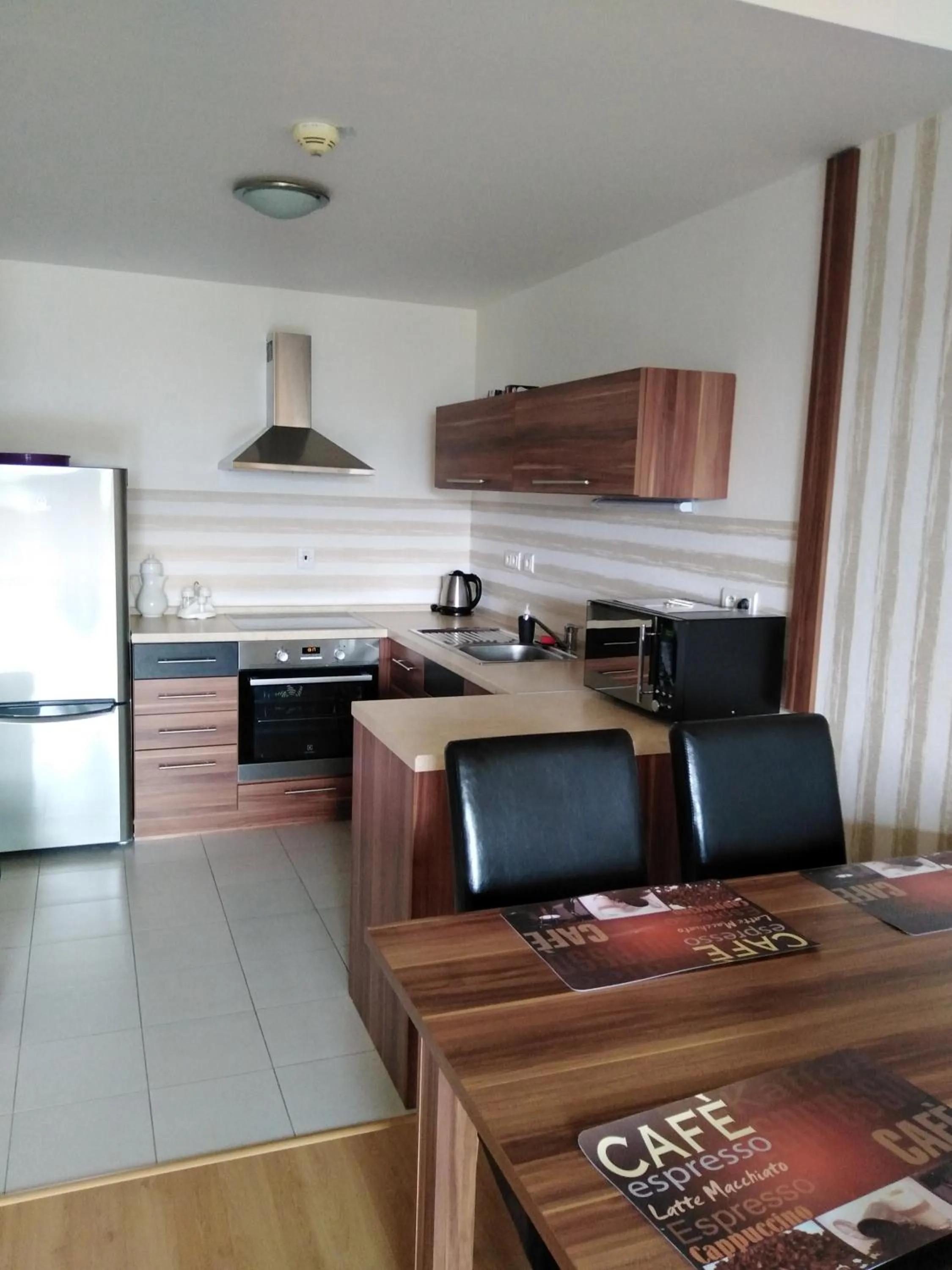 Kitchen or kitchenette in Apartman MARLEA