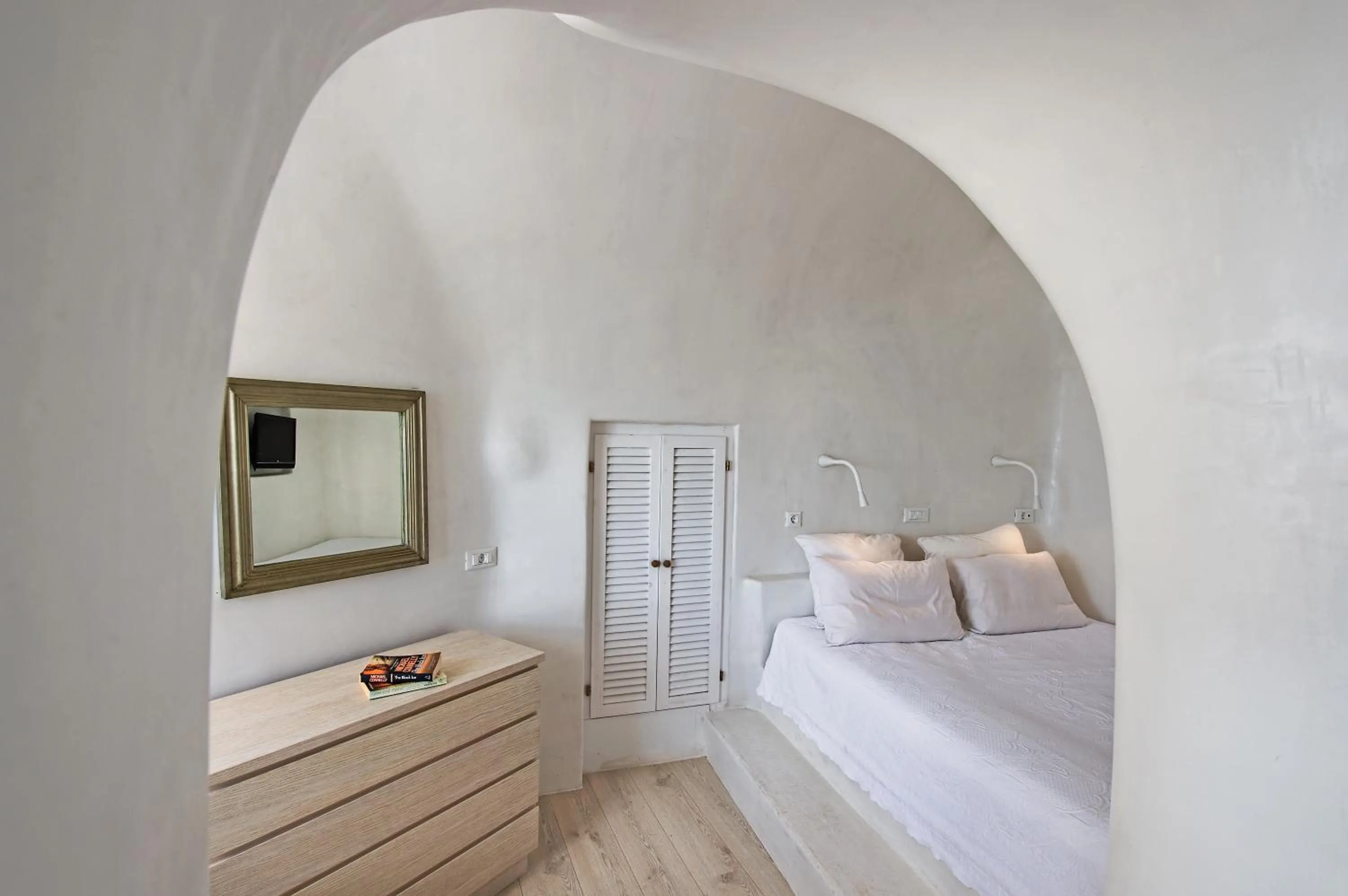 Bed in Porto Fira Suites