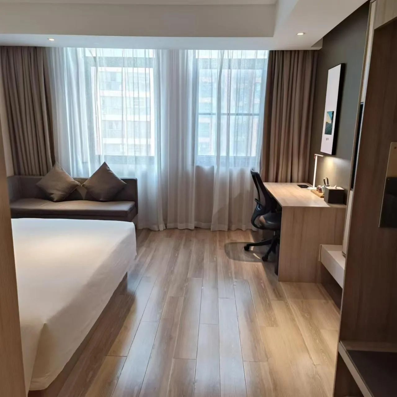 Bed in Atour Hotel Wuhan East Railway Station Optics Valley High-tech