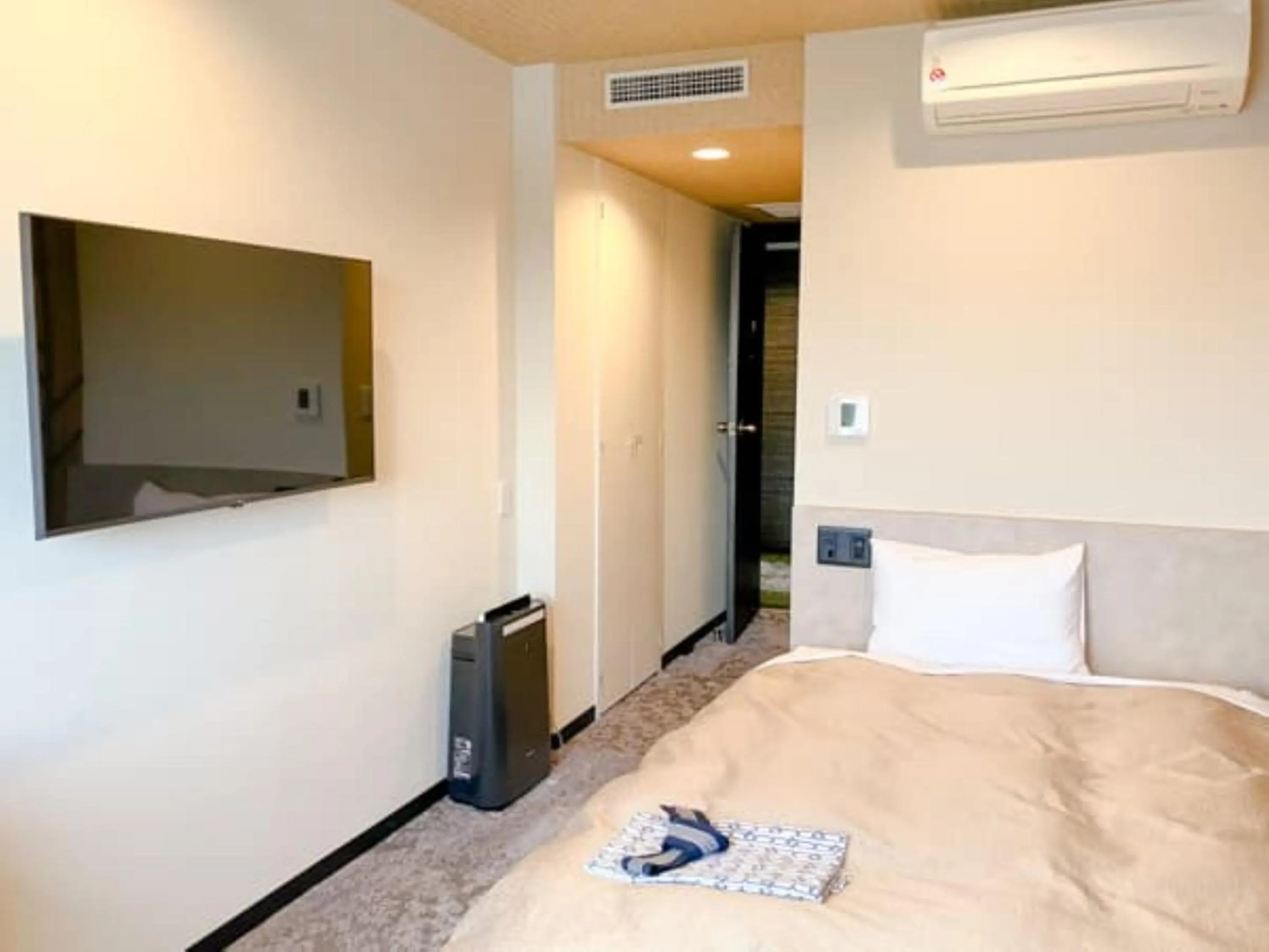 Photo of the whole room, Bed in HOTEL LiVEMAX Toyooka