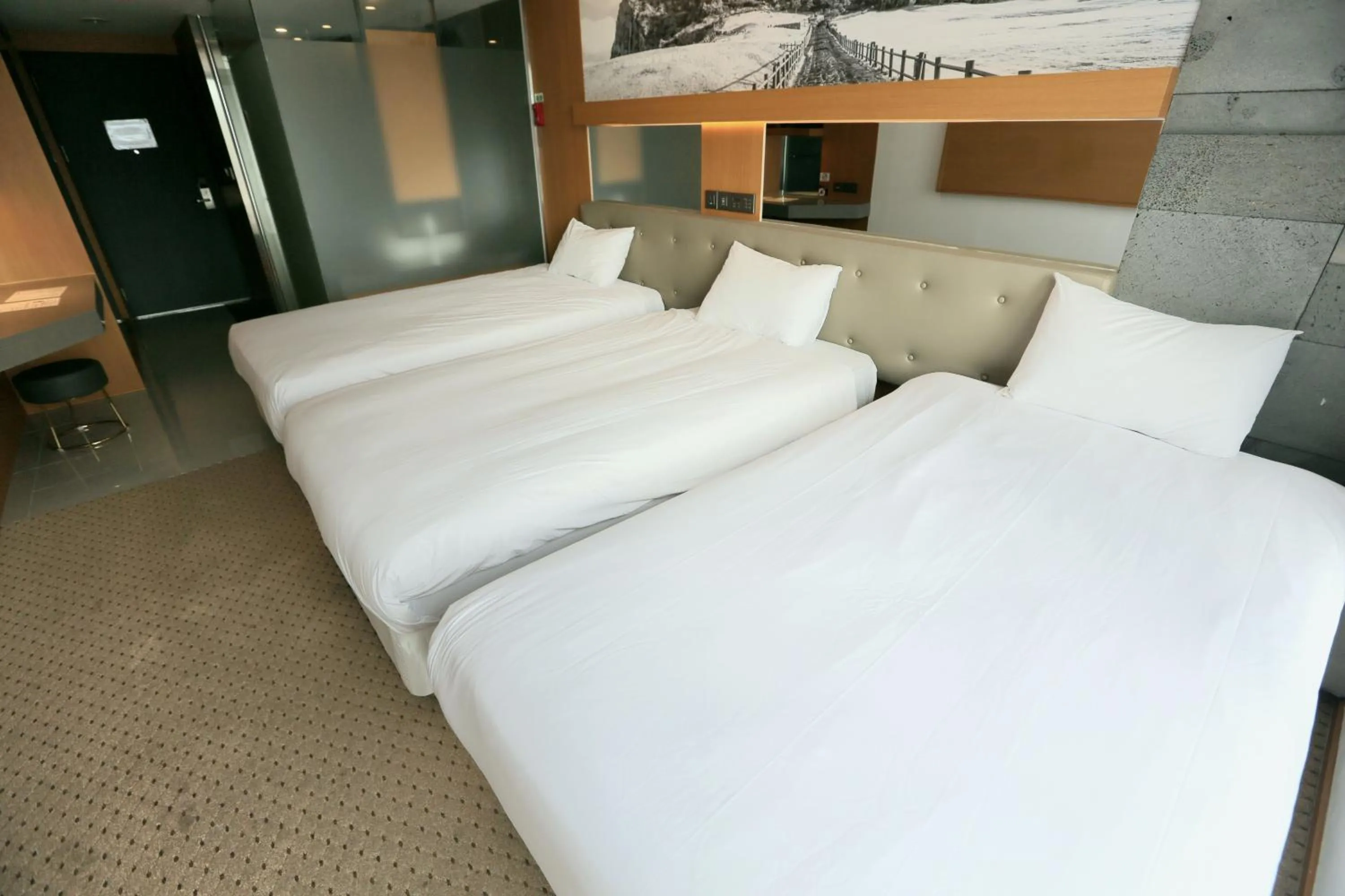 Bed in Asia Hotel Jeju