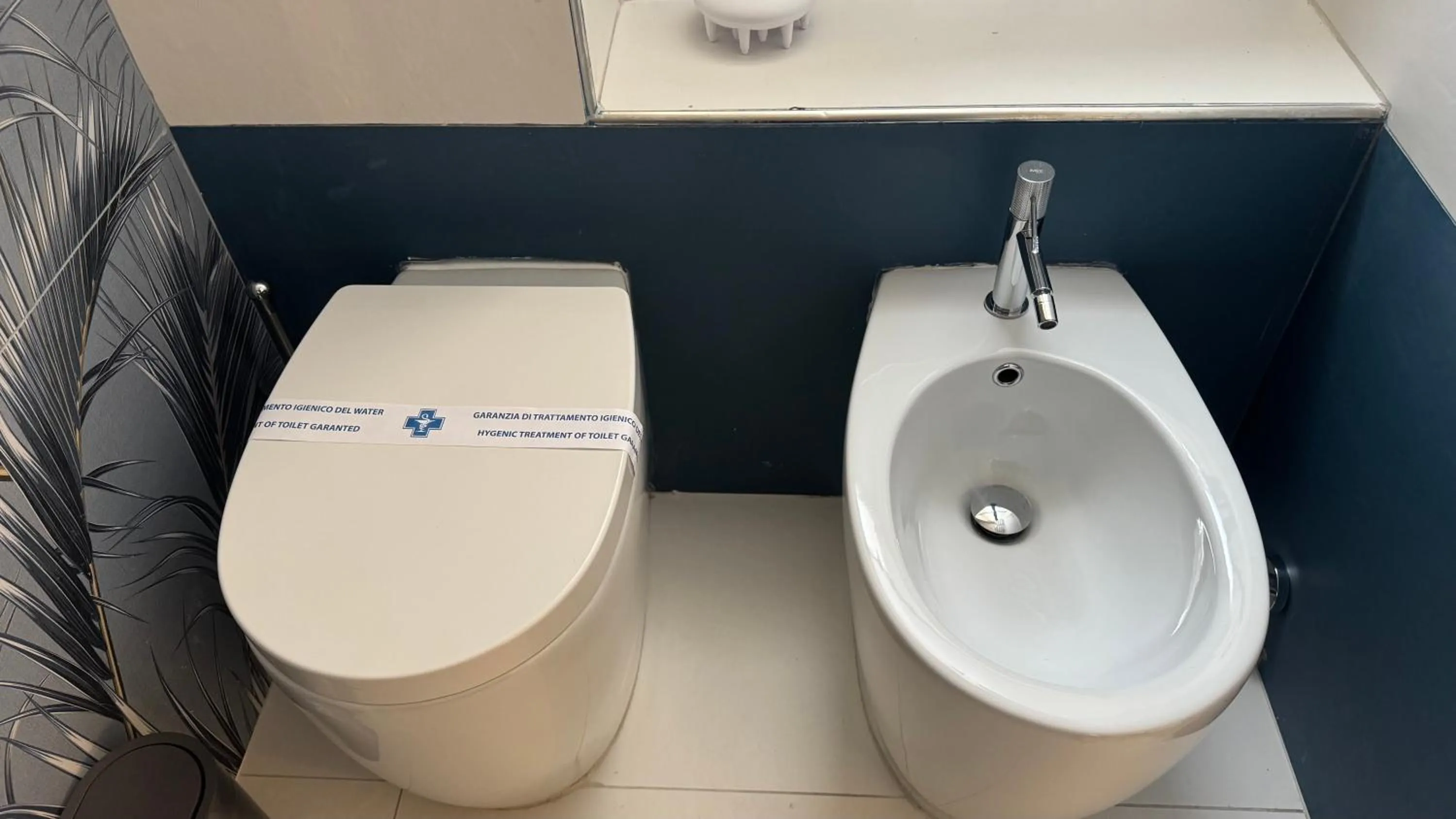 Toilet in AC GOLD B&B Boutique Rooms & Suite