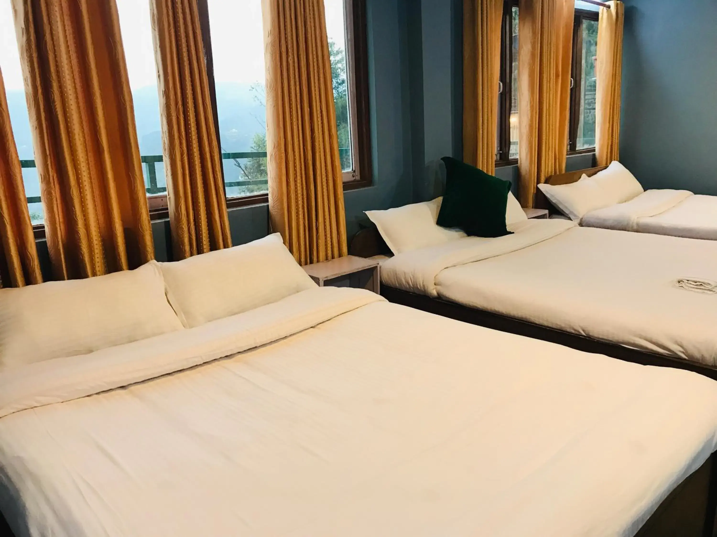 Classic Triple Room in Mita Hotel - Land of Himalayas Classic Triple Room in Mita Hotel - Land of Himalayas