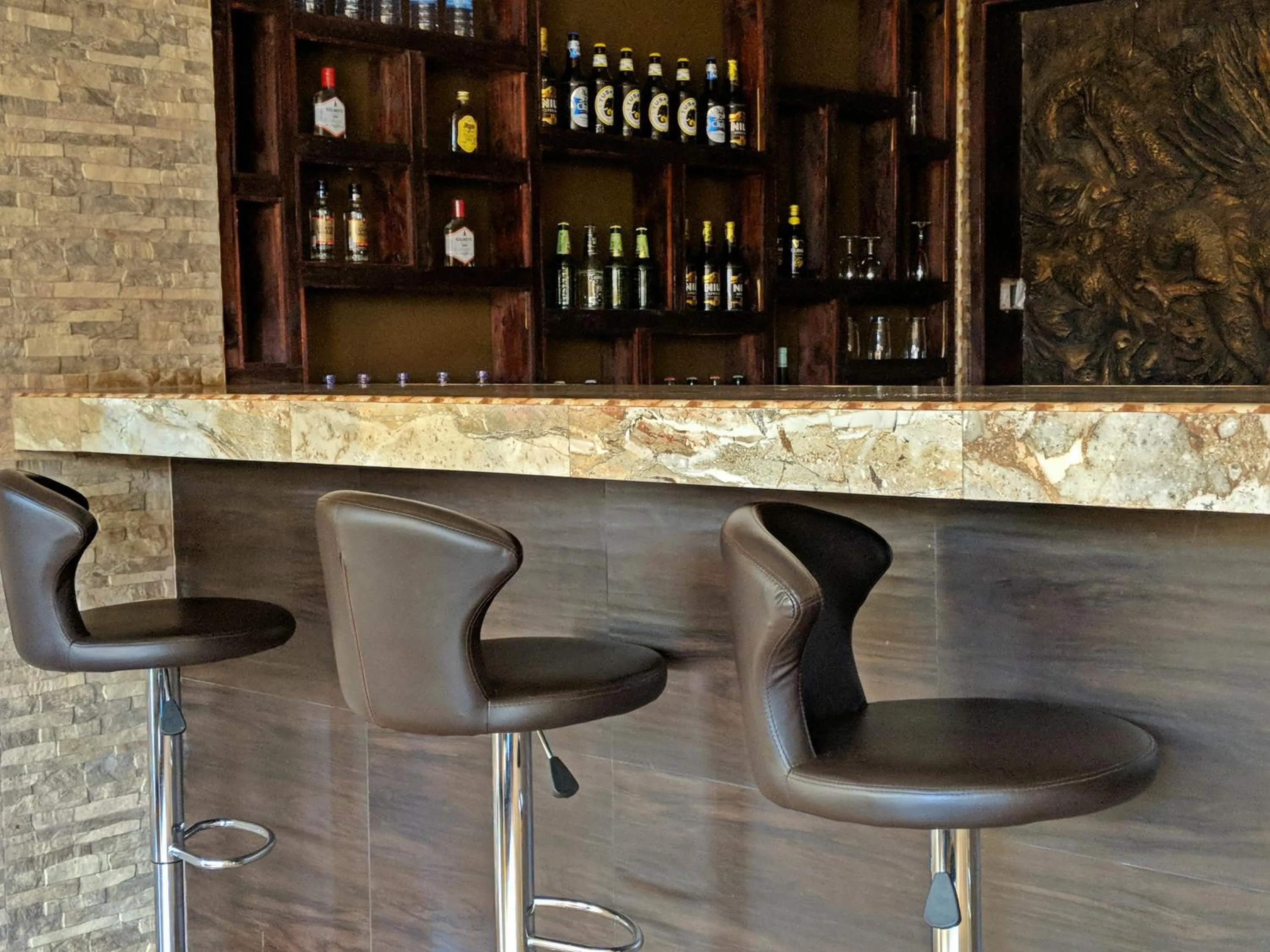 Lounge or bar in Prestige Hotel Suites