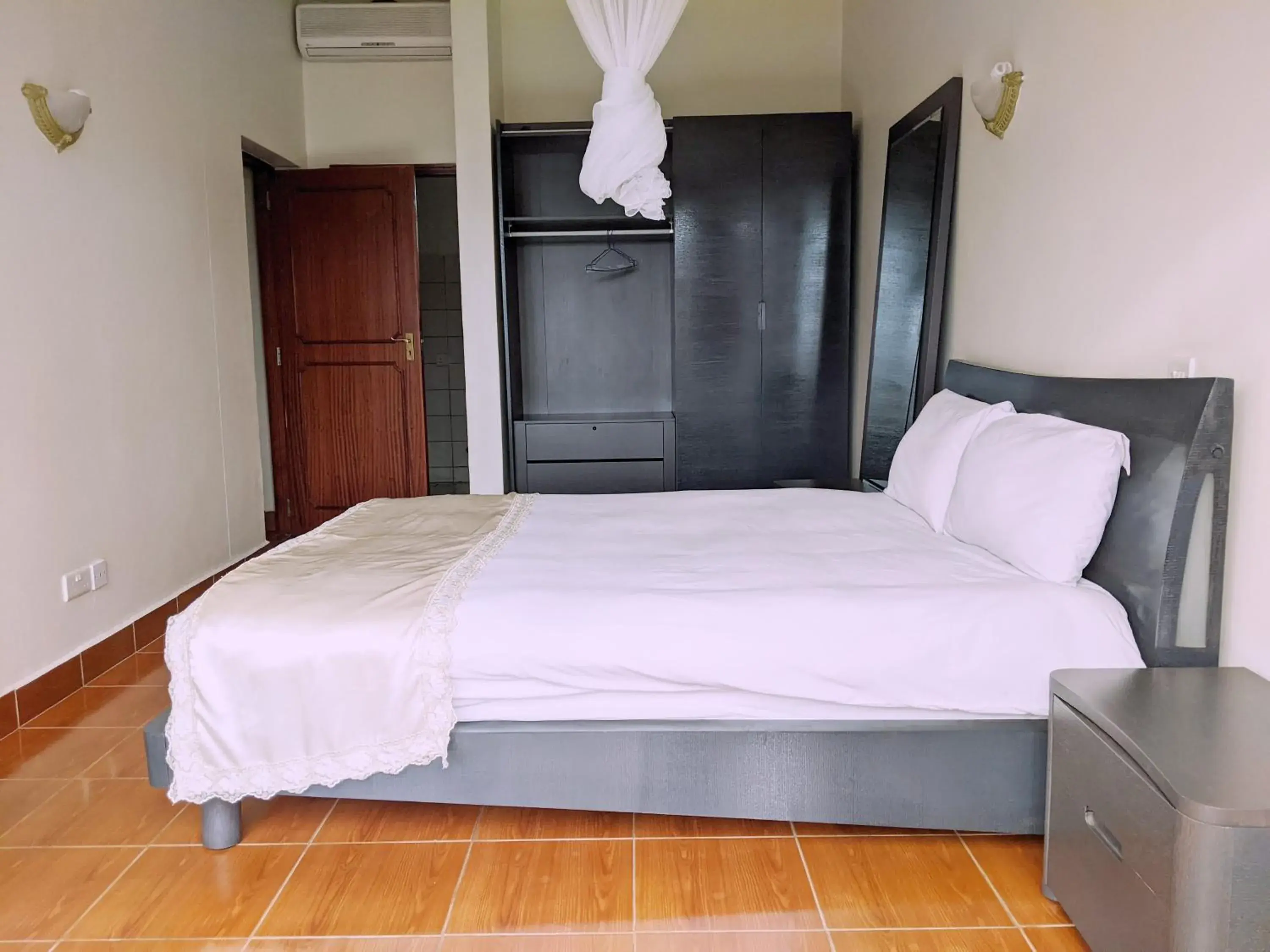 Bed in Prestige Hotel Suites Bed in Prestige Hotel Suites