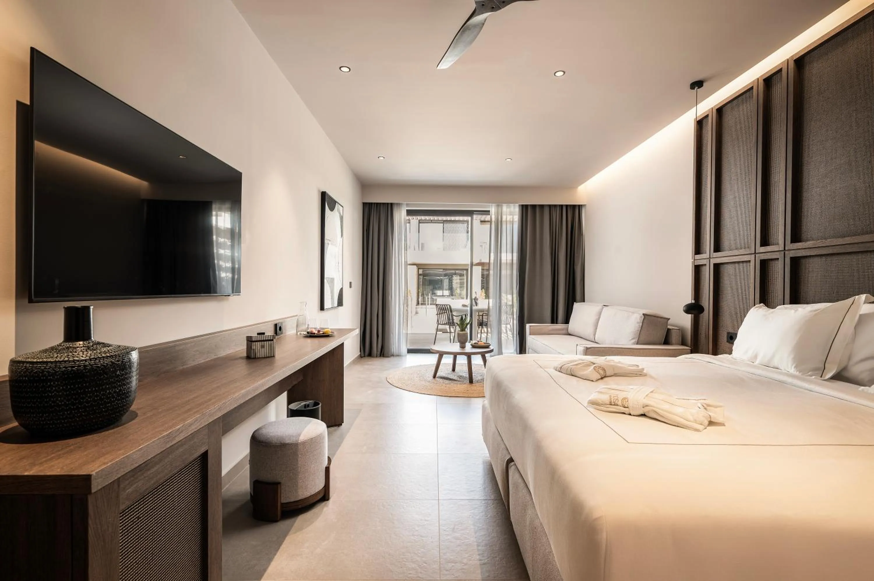 Bed in Mosay All Suite Hotel