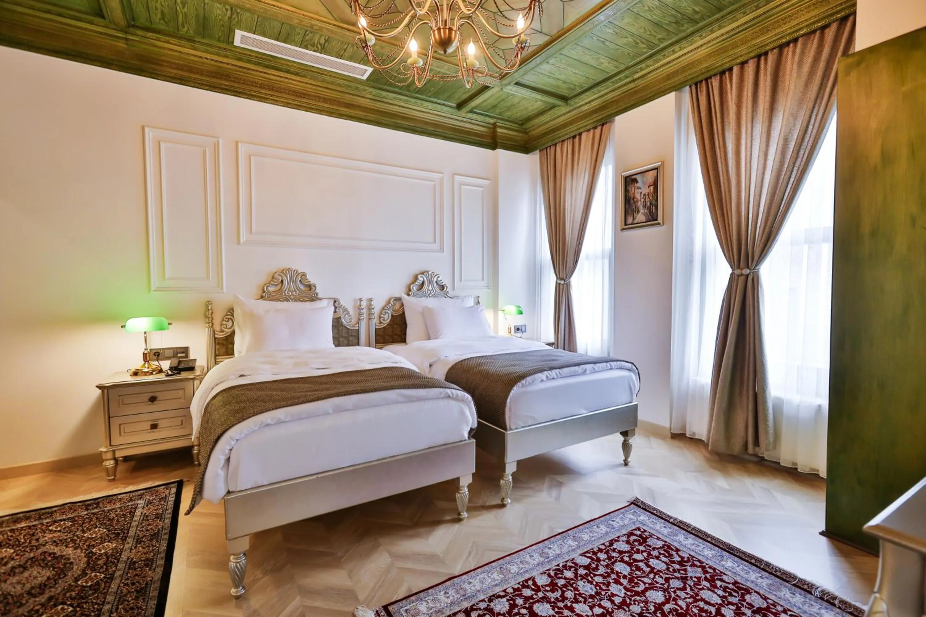Bed in Emerald Mansion Hotel