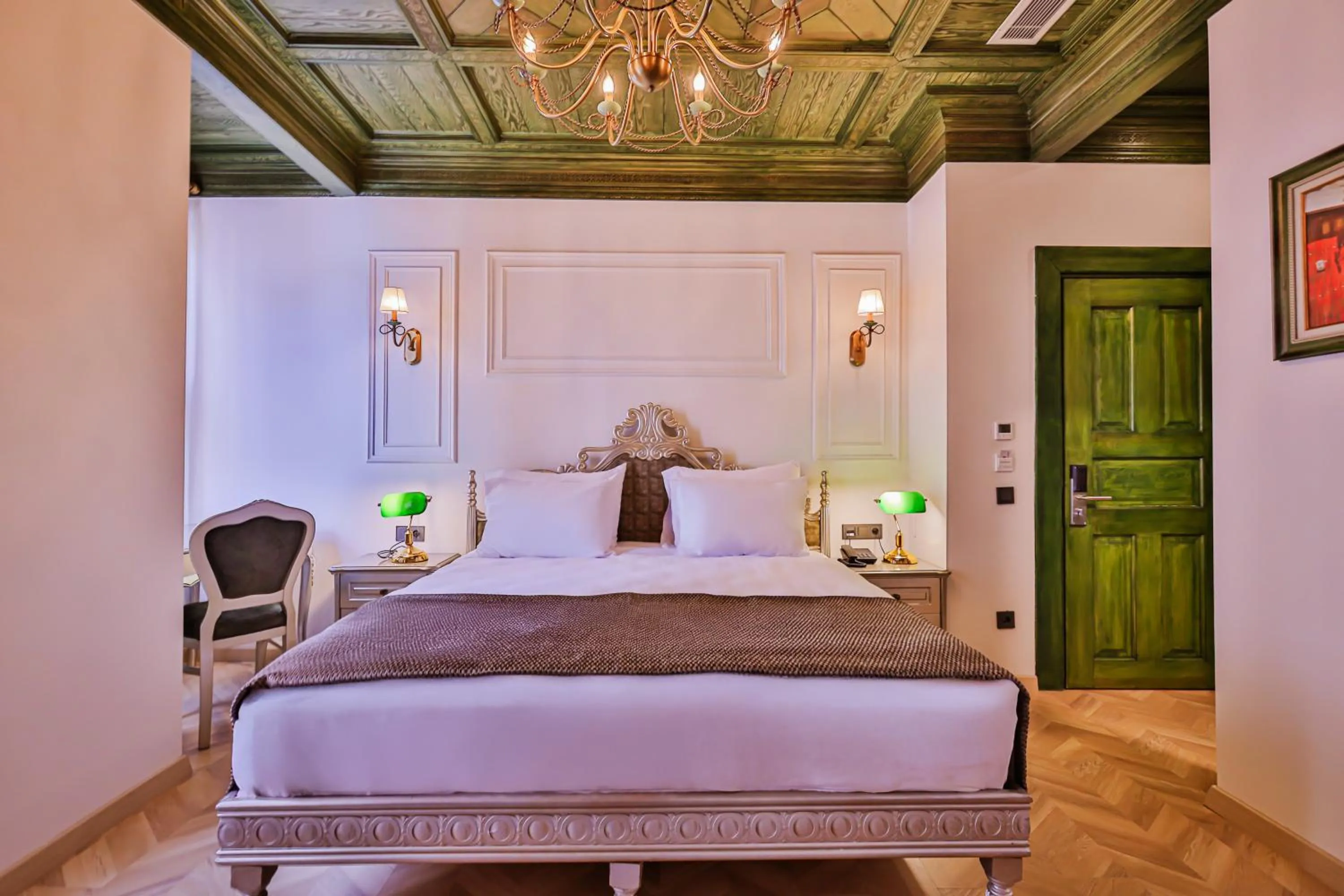Bed in Emerald Mansion Hotel