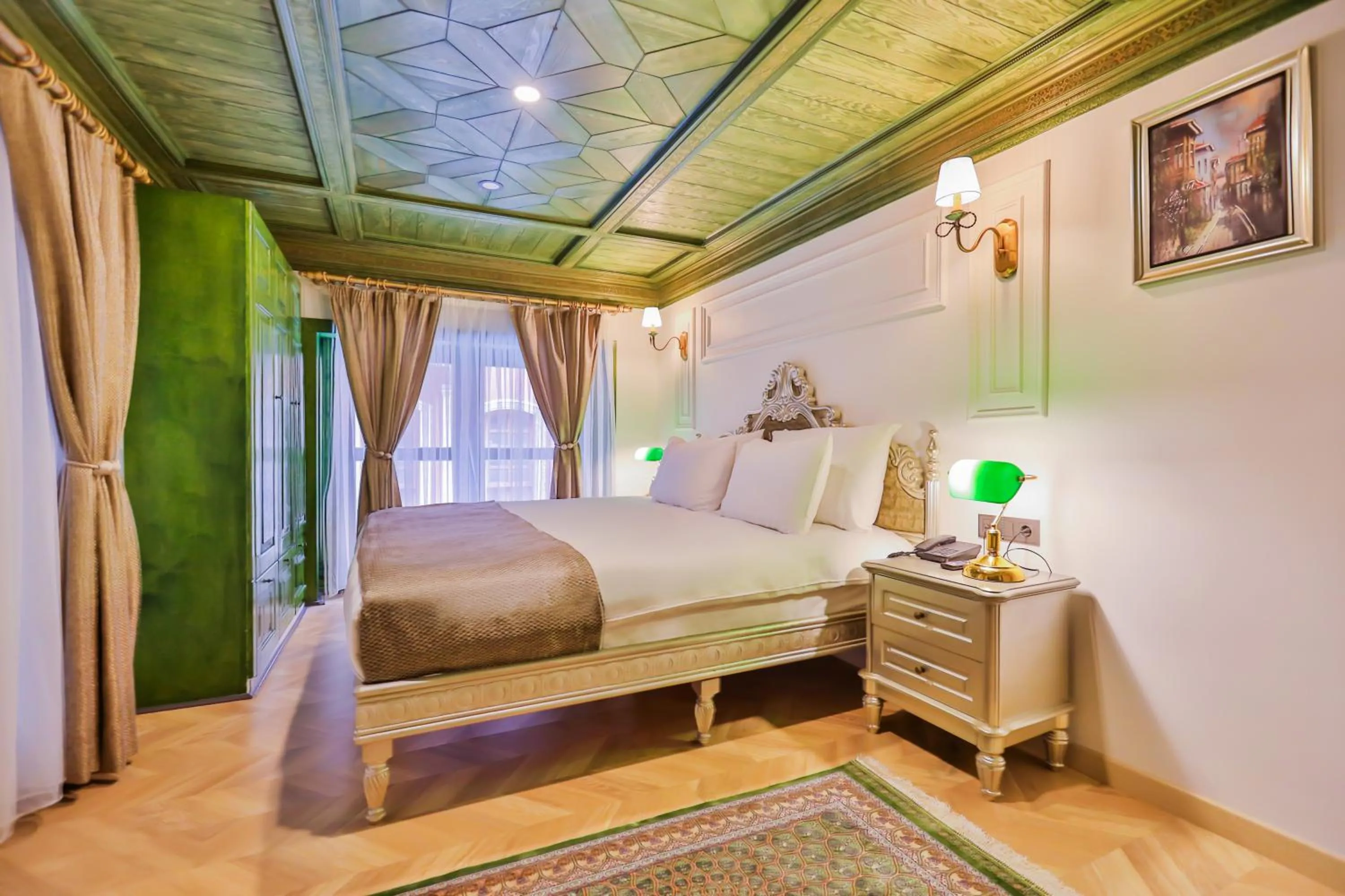 Bed in Emerald Mansion Hotel