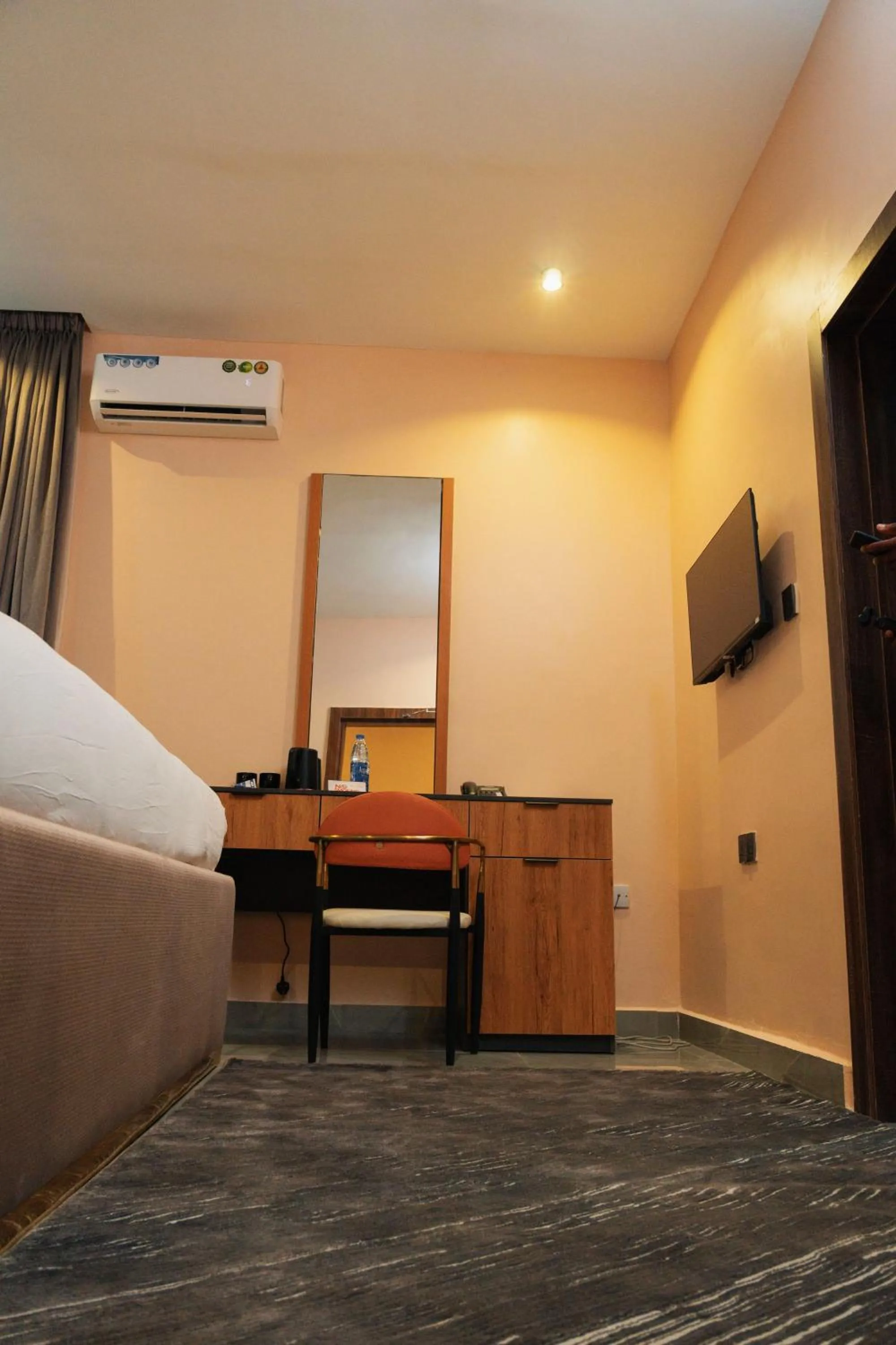 Bedroom in The Manor Hotel by Luckzi