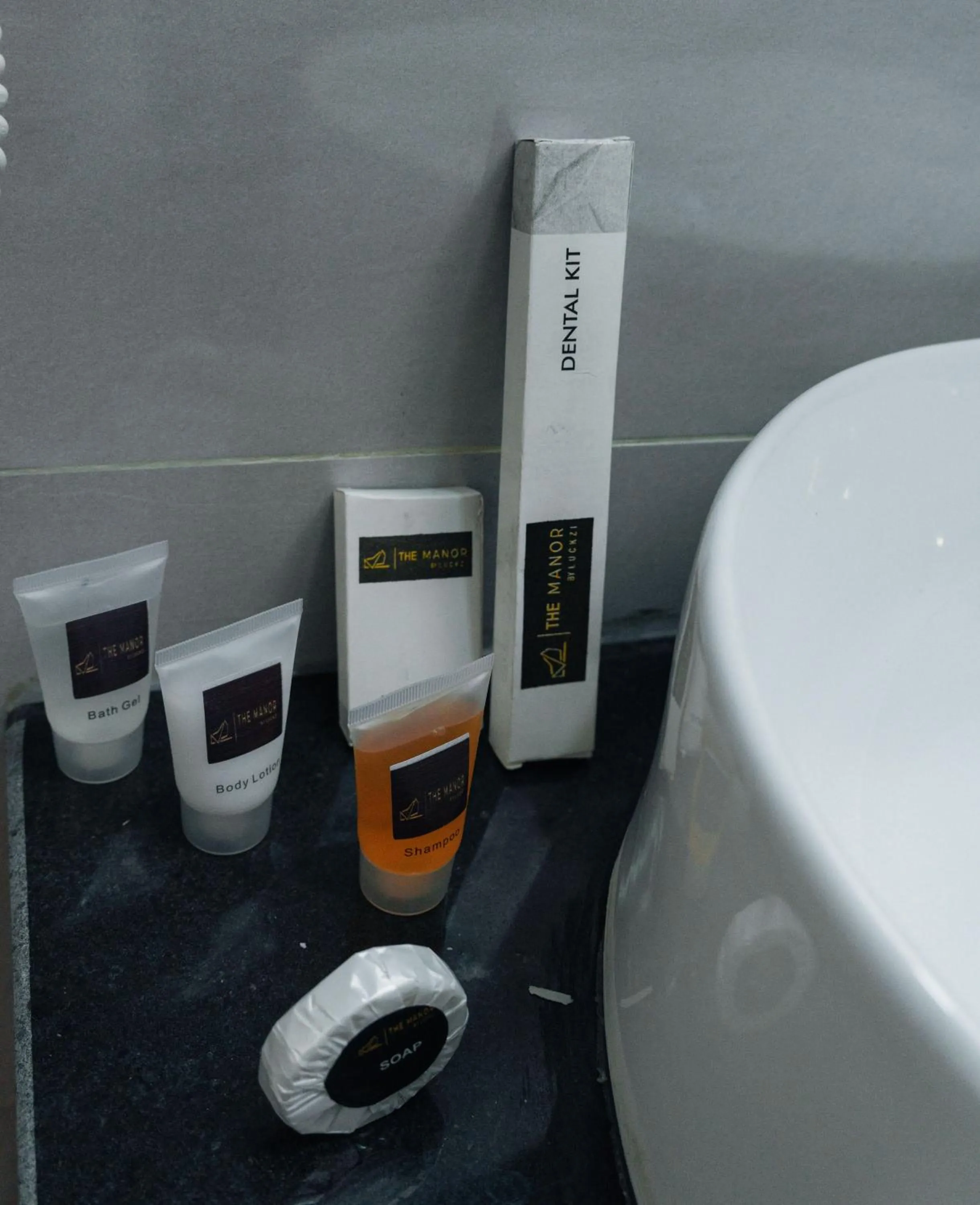 Bathroom in The Manor Hotel by Luckzi