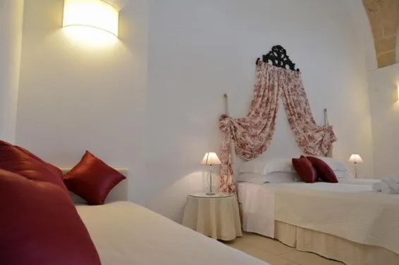 Photo of the whole room, Bed in Masseria Palane