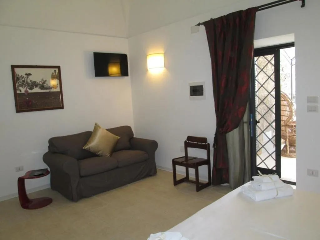 Photo of the whole room, Bed in Masseria Palane