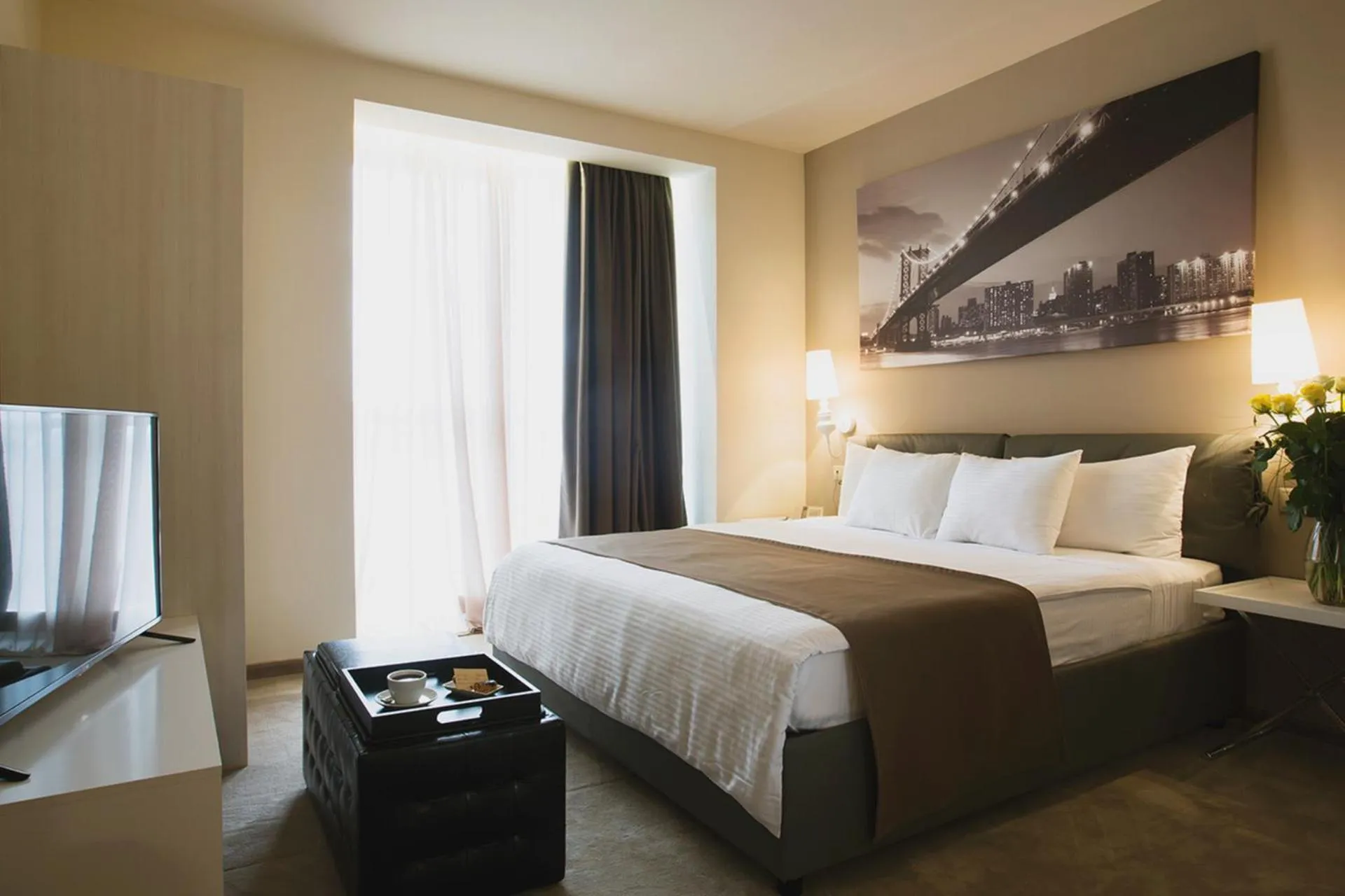 Bed in Opera Suite Hotel