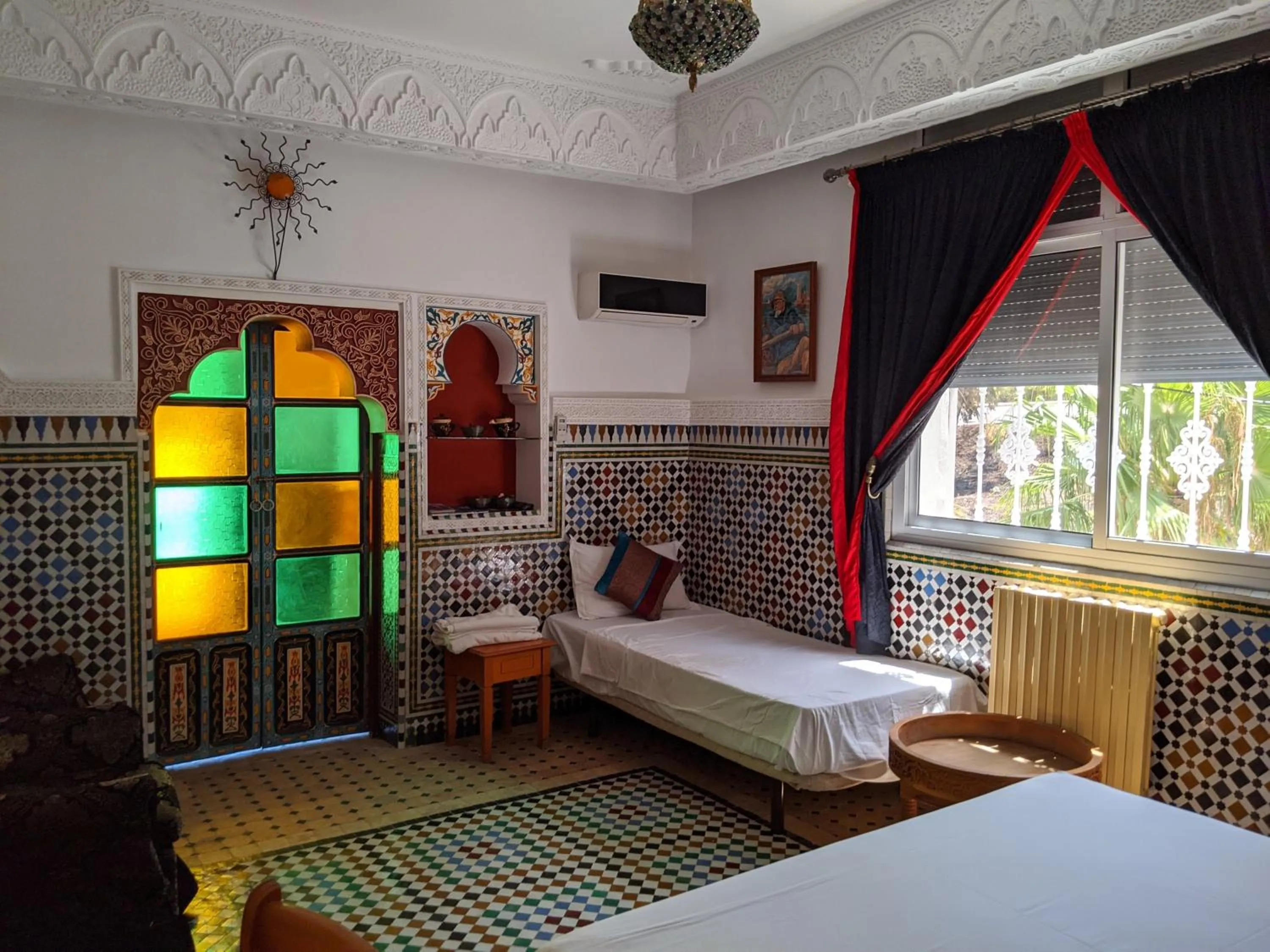 Photo of the whole room, Bed in Malabata Guest House