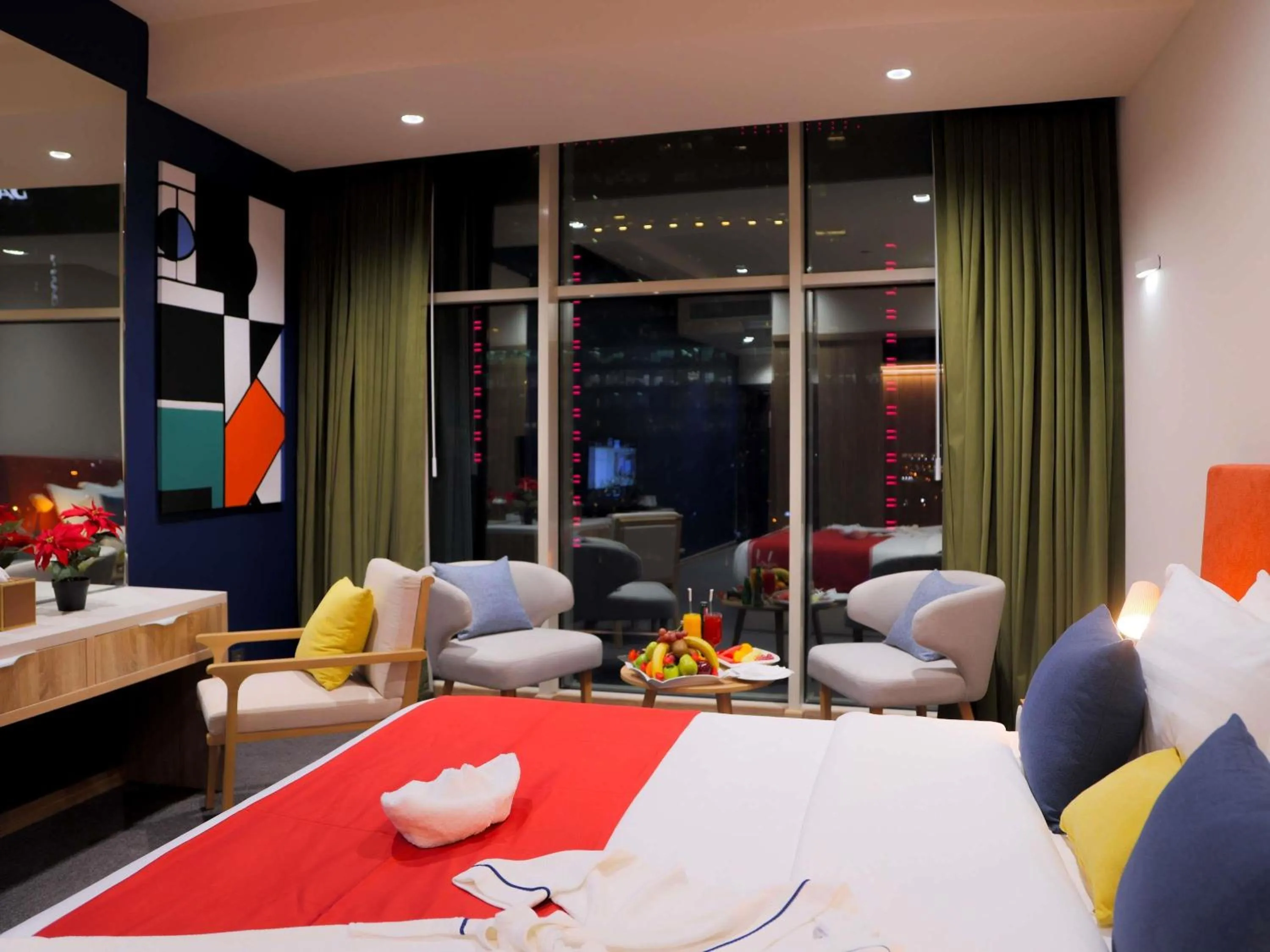 Bedroom in Novotel Suites Riyadh Centre