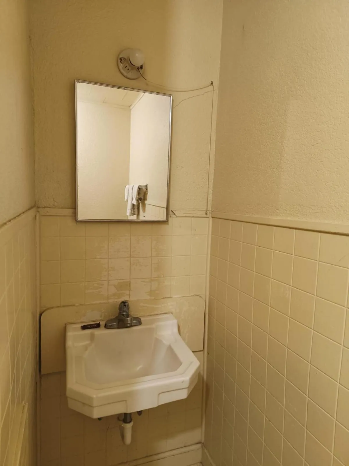 Bathroom in Triangle Motel by OYO Mexia Texas