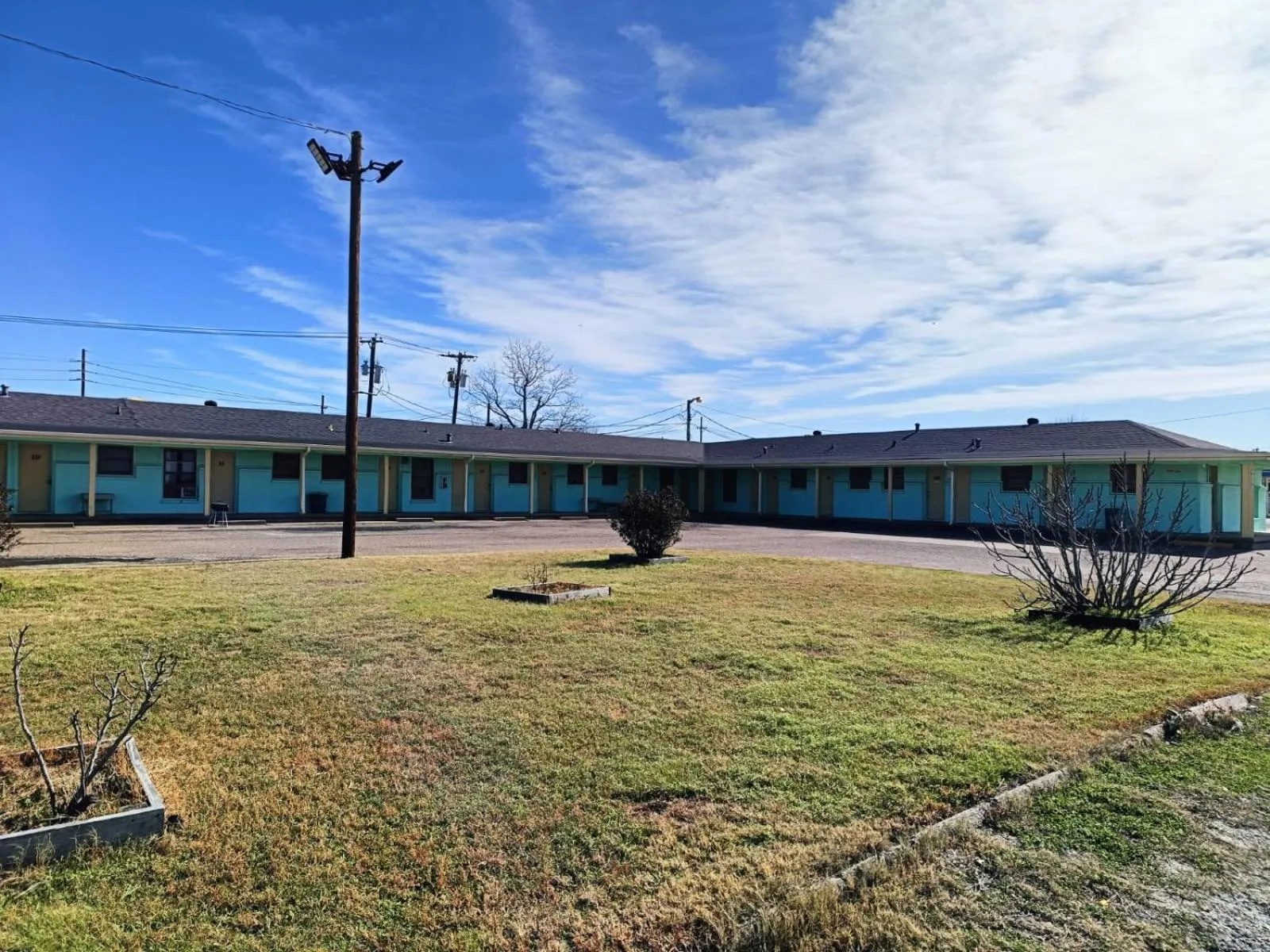 Property building in Triangle Motel by OYO Mexia Texas