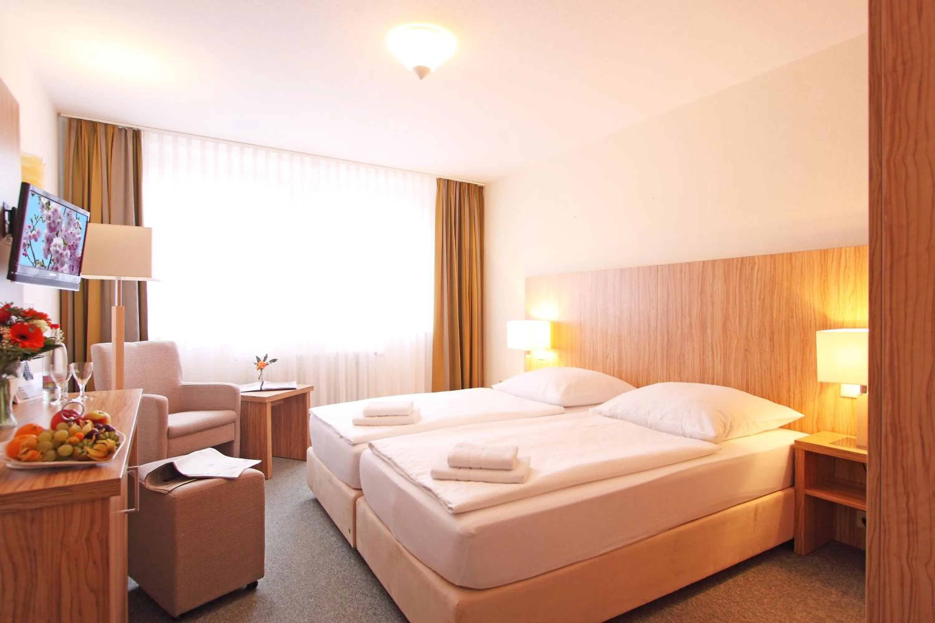 Photo of the whole room, Bed in Akzent Hotel Am Burgholz