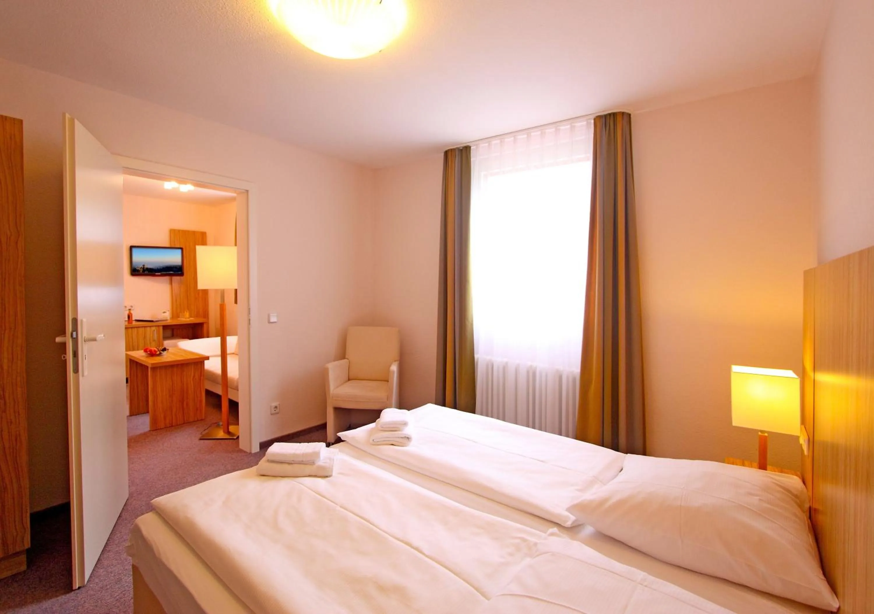 Photo of the whole room, Bed in Akzent Hotel Am Burgholz