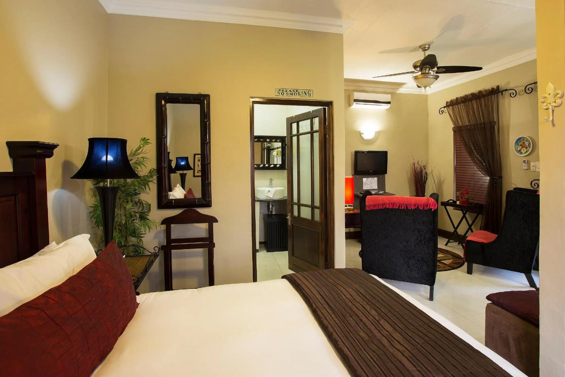 Bed in The Royal Palm B&B