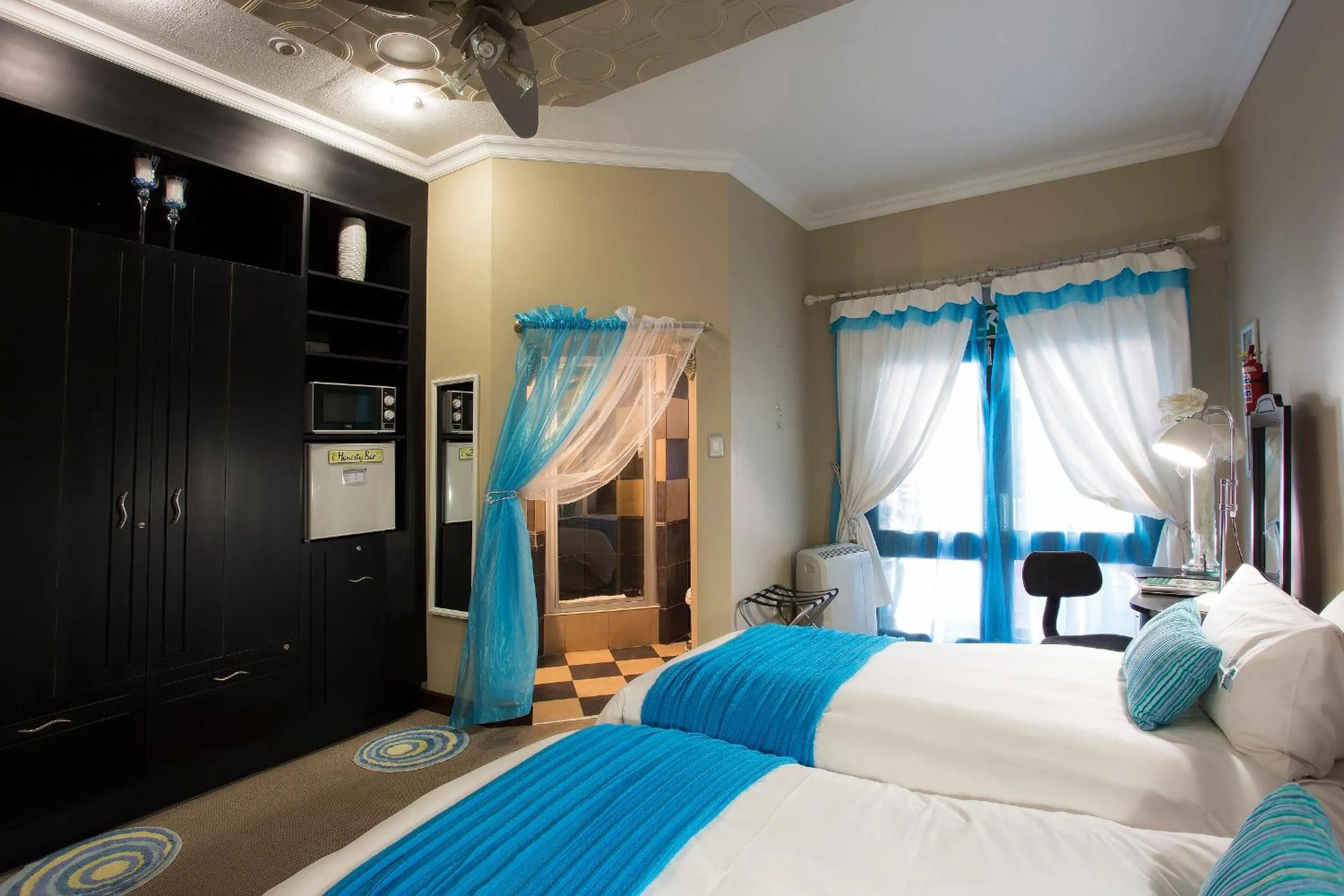 Bed in The Royal Palm B&B